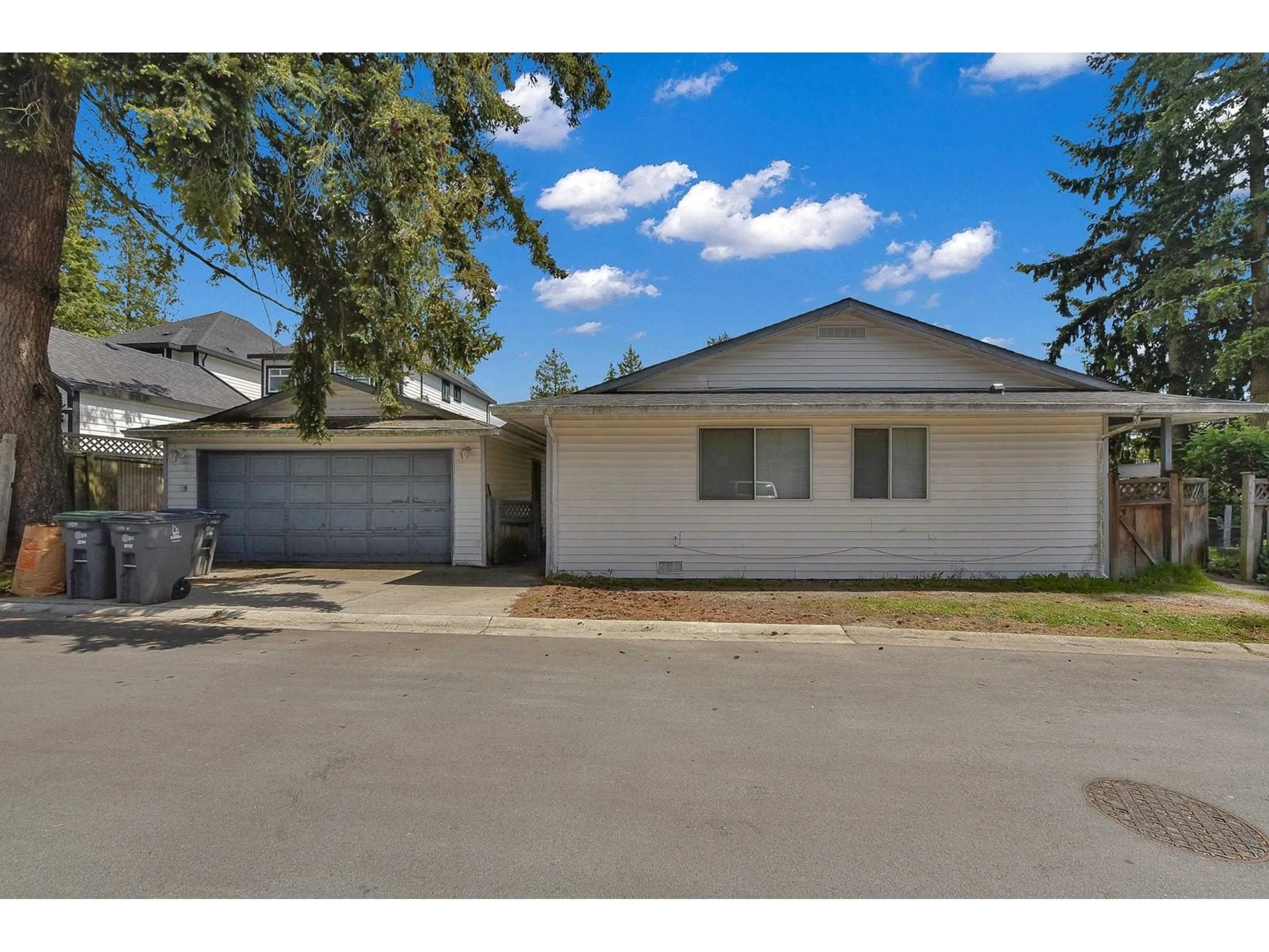 Home with vinyl exterior material, street for 12835 60, Surrey British Columbia V3X2C2