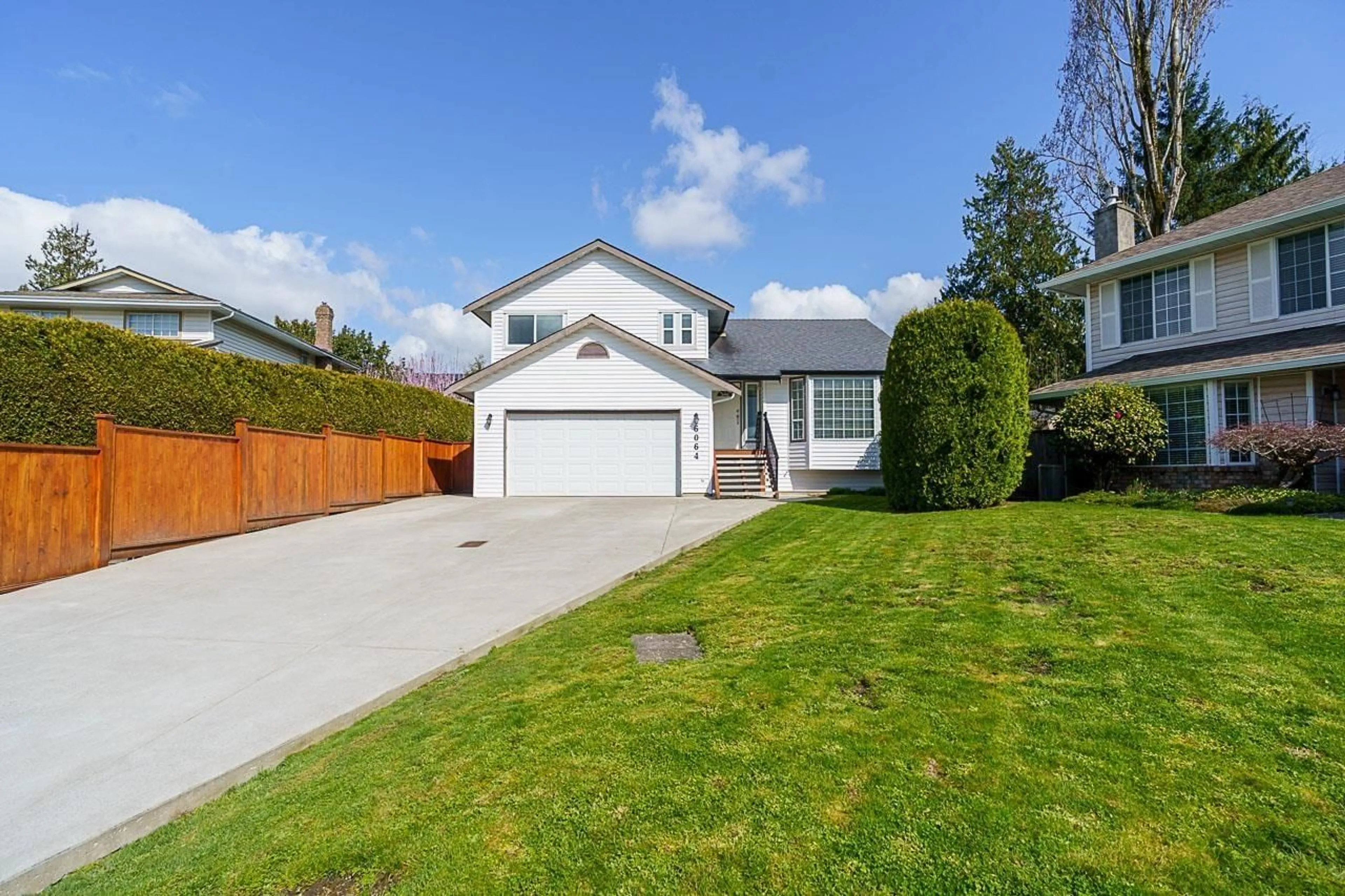A pic from outside/outdoor area/front of a property/back of a property/a pic from drone, street for 6064 180A, Surrey British Columbia V3S6W6