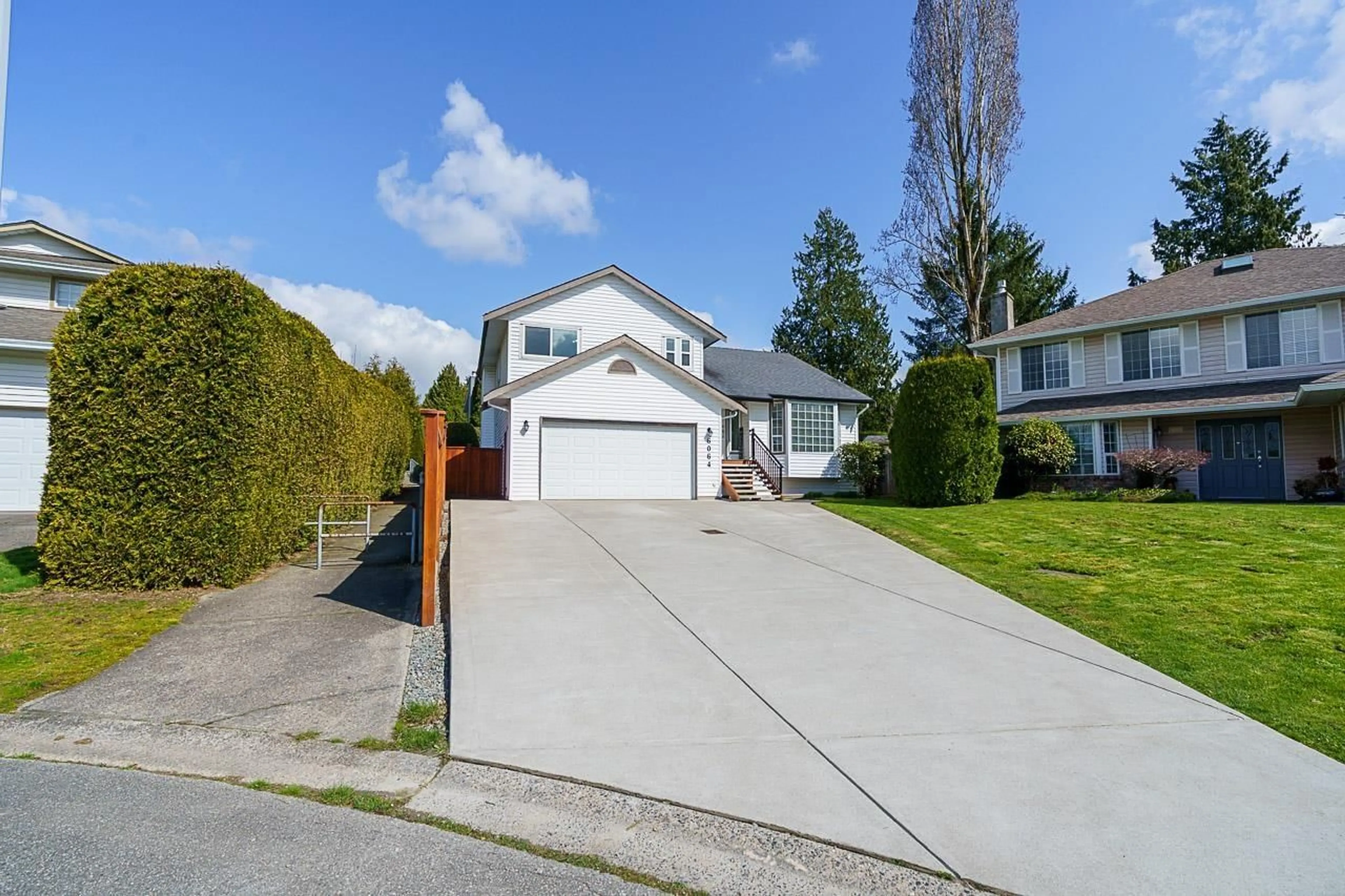 Home with vinyl exterior material, street for 6064 180A, Surrey British Columbia V3S6W6
