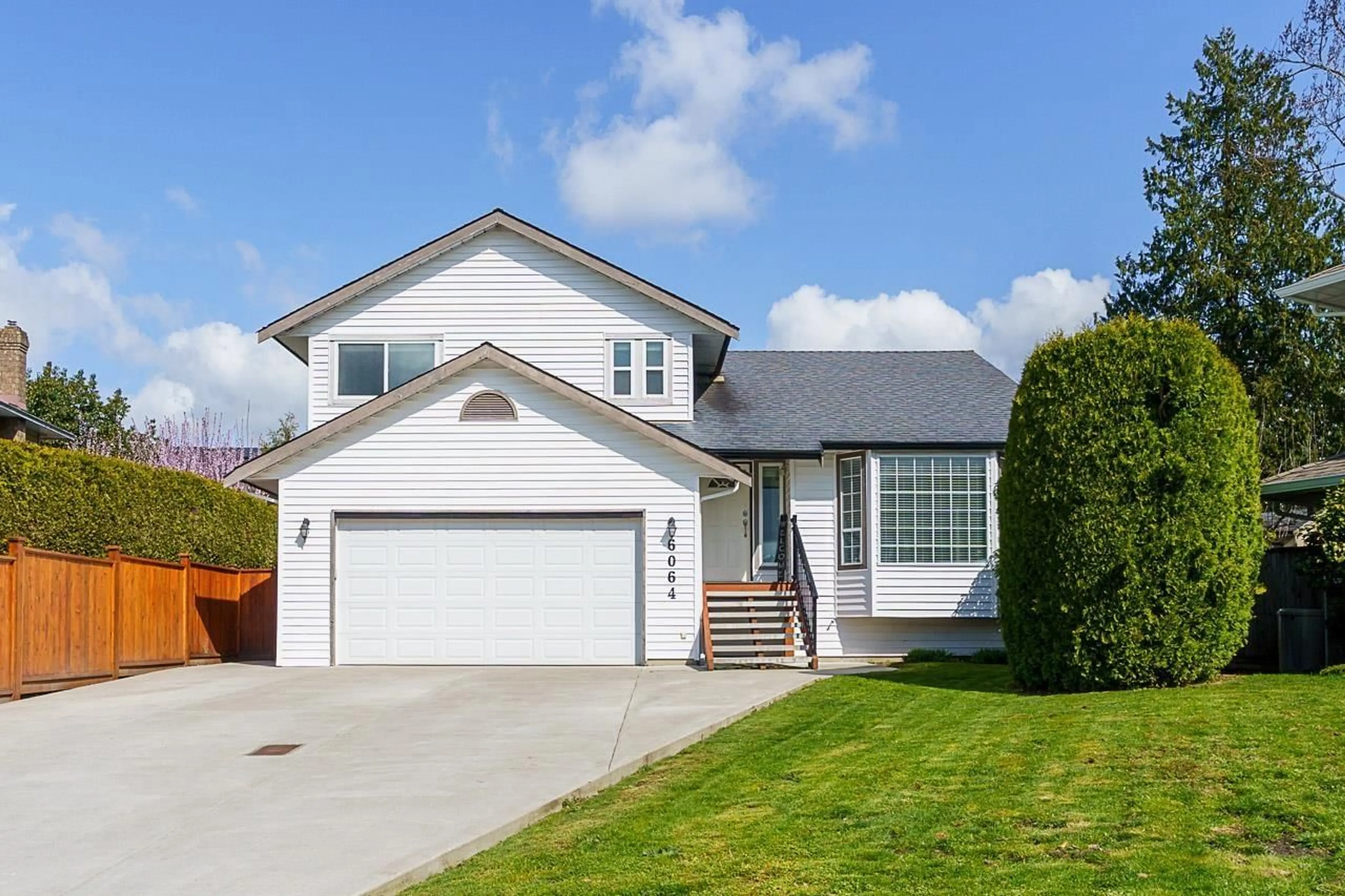Home with vinyl exterior material, street for 6064 180A, Surrey British Columbia V3S6W6