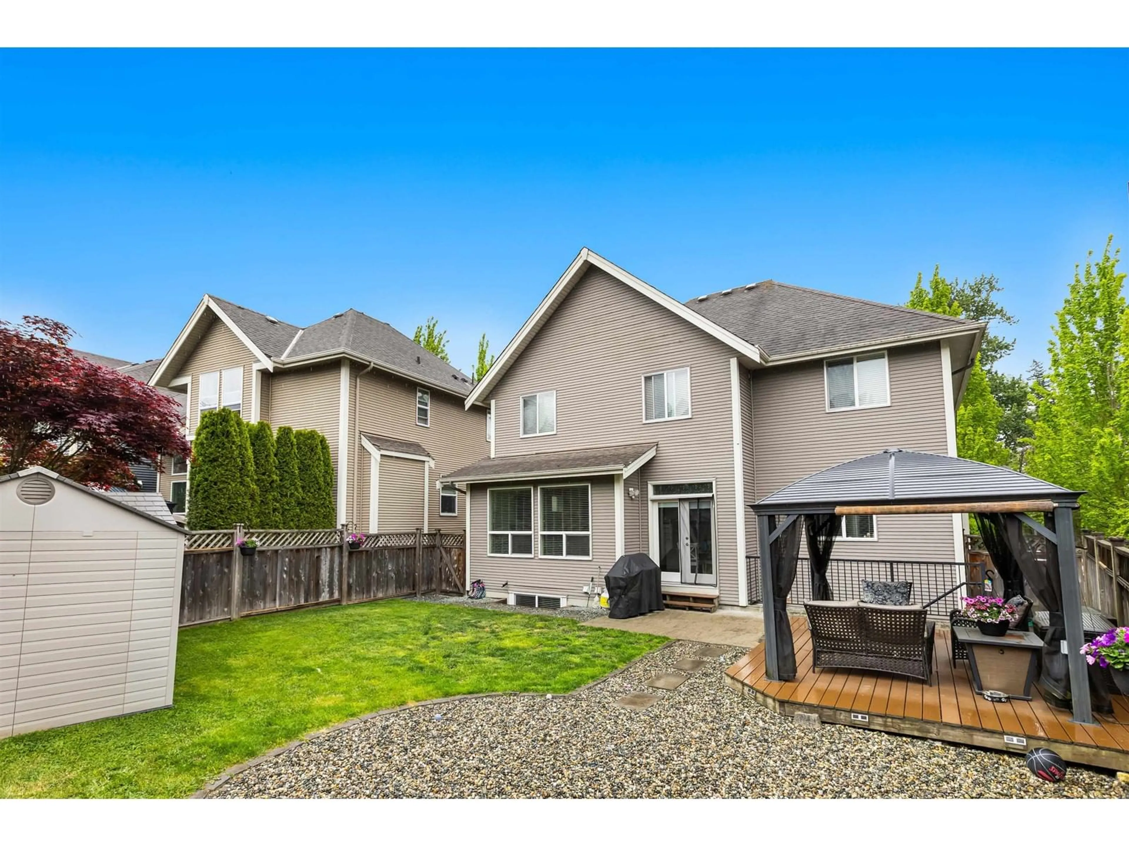 Home with vinyl exterior material, street for 7065 208A, Langley British Columbia V2Y0J2