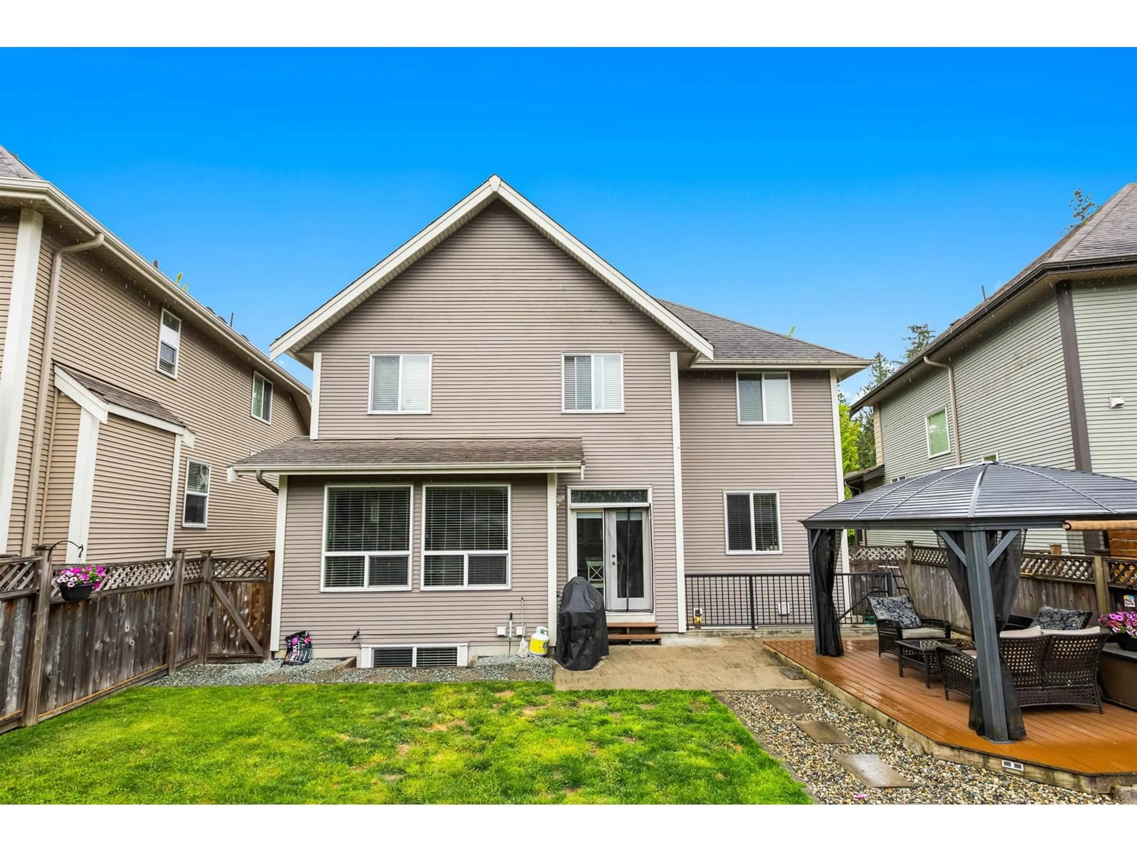Home with vinyl exterior material, street for 7065 208A, Langley British Columbia V2Y0J2