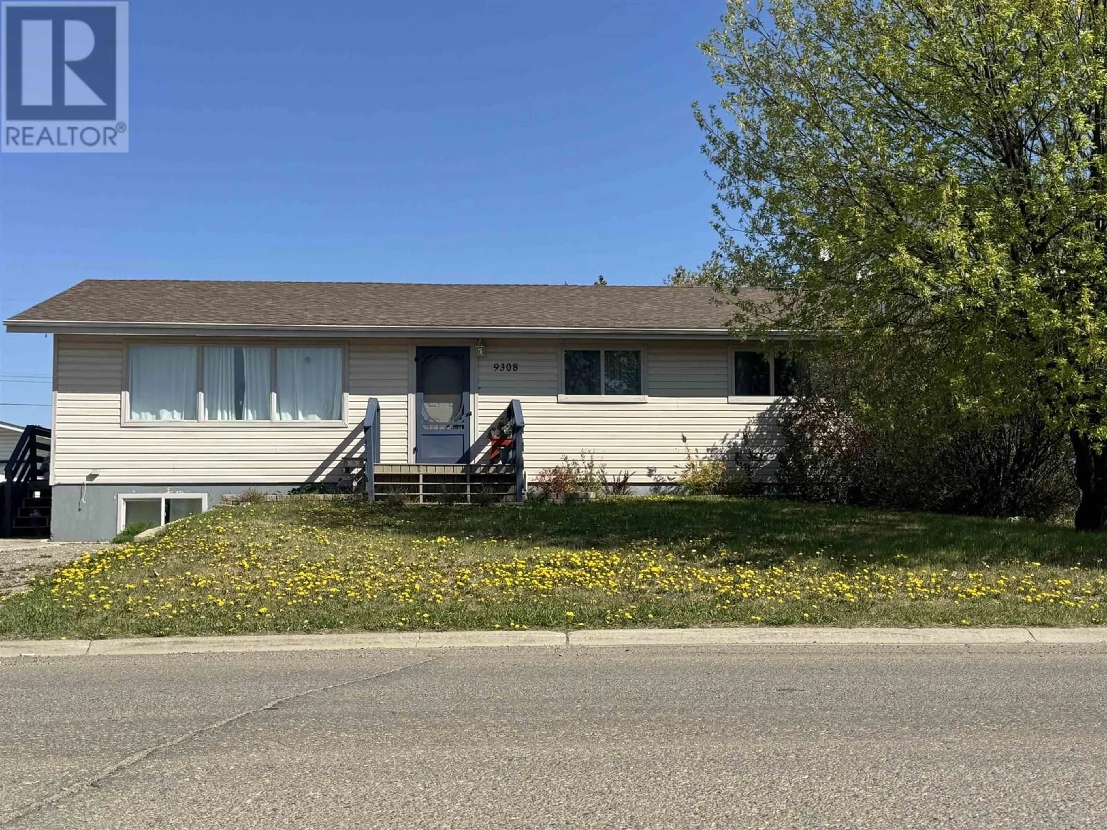 Home with vinyl exterior material, street for 9308 94 AVENUE, Fort St. John British Columbia V1J1G2