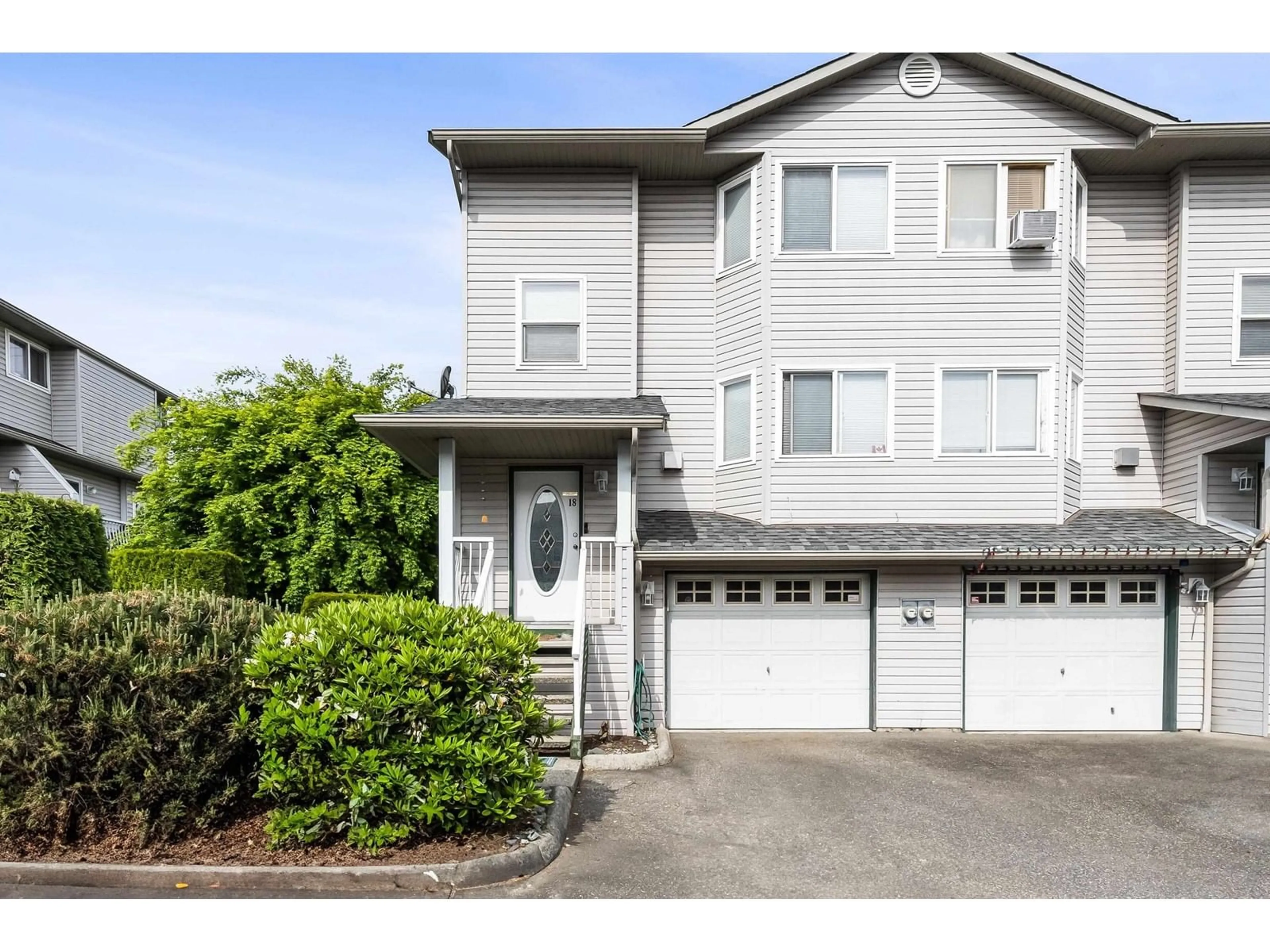 Home with vinyl exterior material, street for 18 - 45090 LUCKAKUCK WAY, Chilliwack British Columbia V2R3Z5