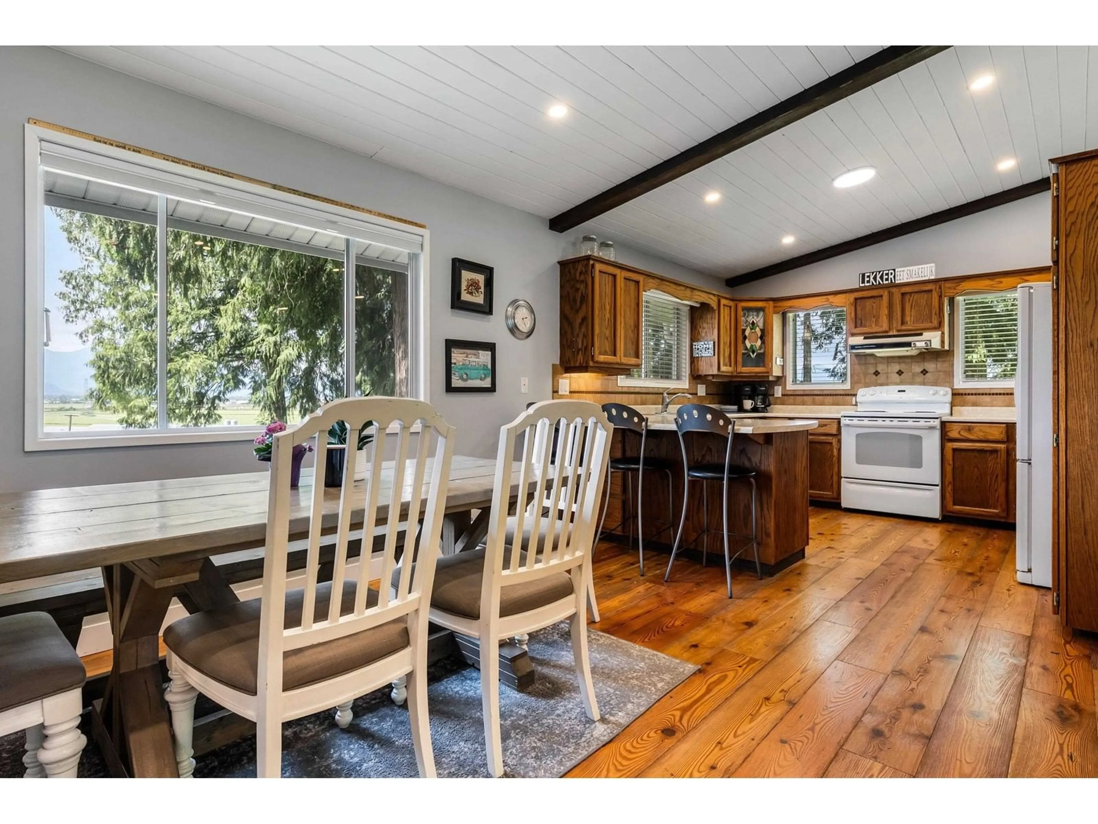 Open concept kitchen, wood/laminate floor for 7965 ANNIS ROAD, Chilliwack British Columbia V2P6H3