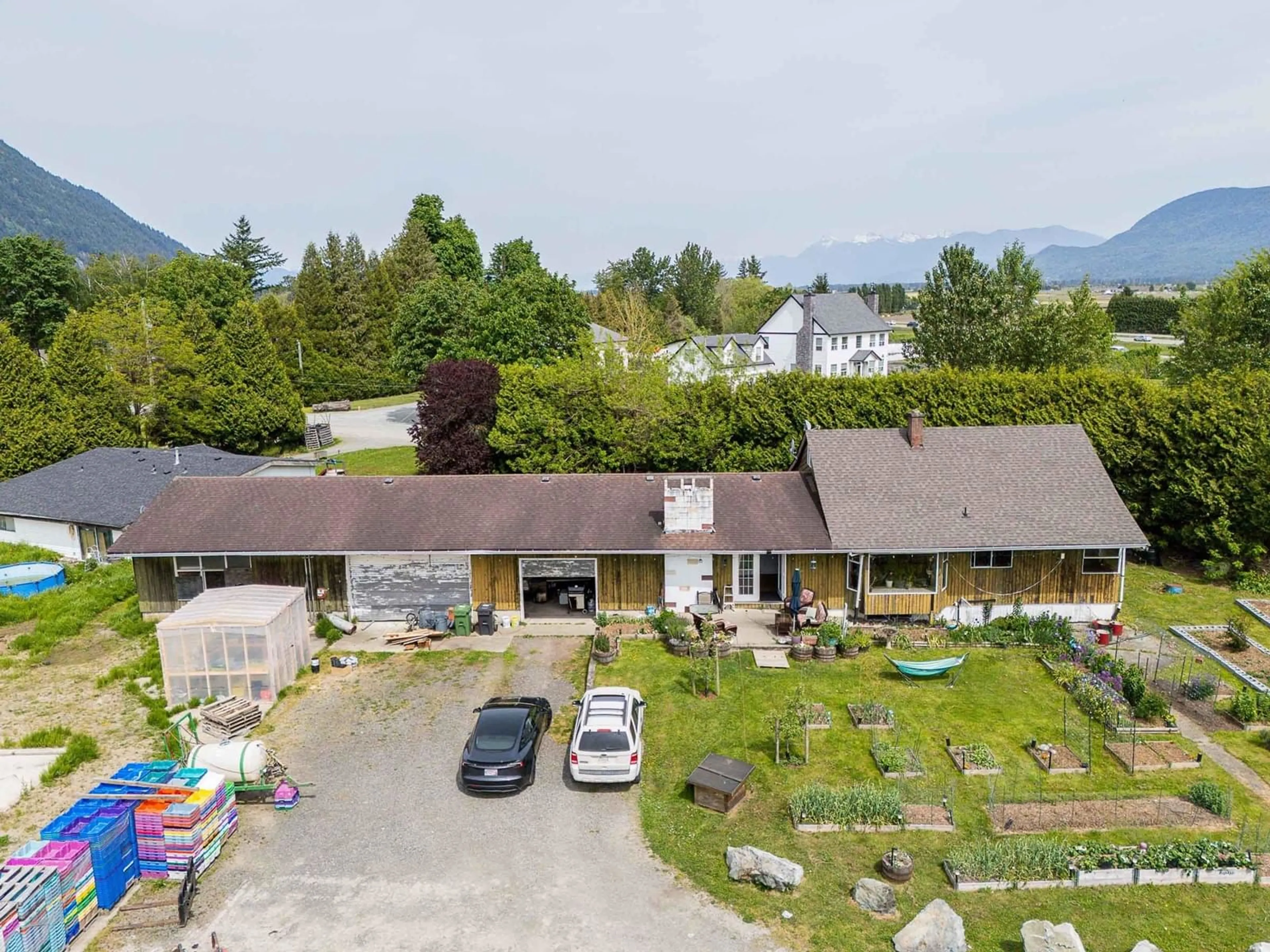A pic from outside/outdoor area/front of a property/back of a property/a pic from drone, mountain view for 3593 MCDERMOTT, Abbotsford British Columbia V3G2J8