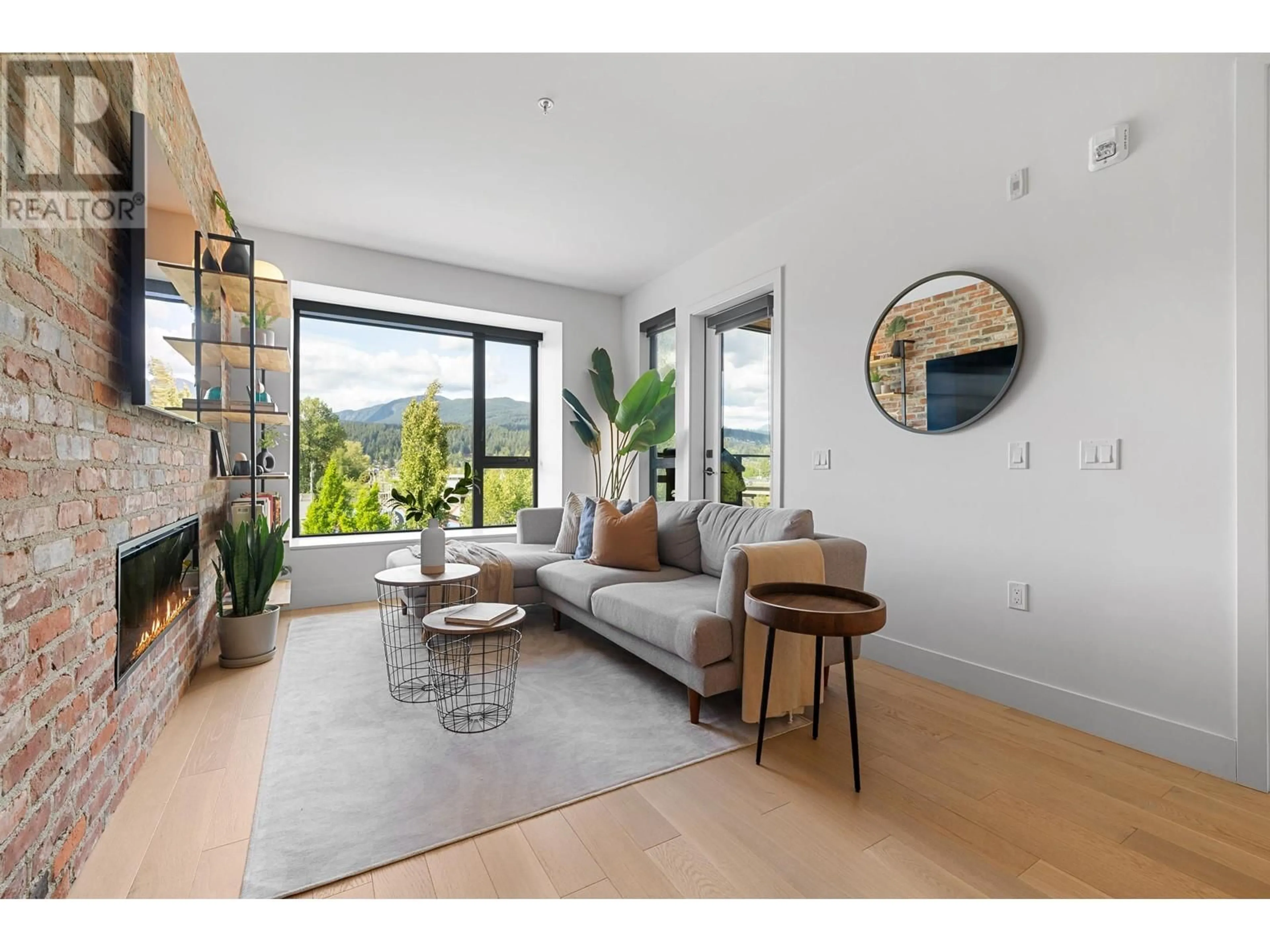 Living room with furniture, unknown for 203 - 83 MOODY STREET, Port Moody British Columbia V3H0K7