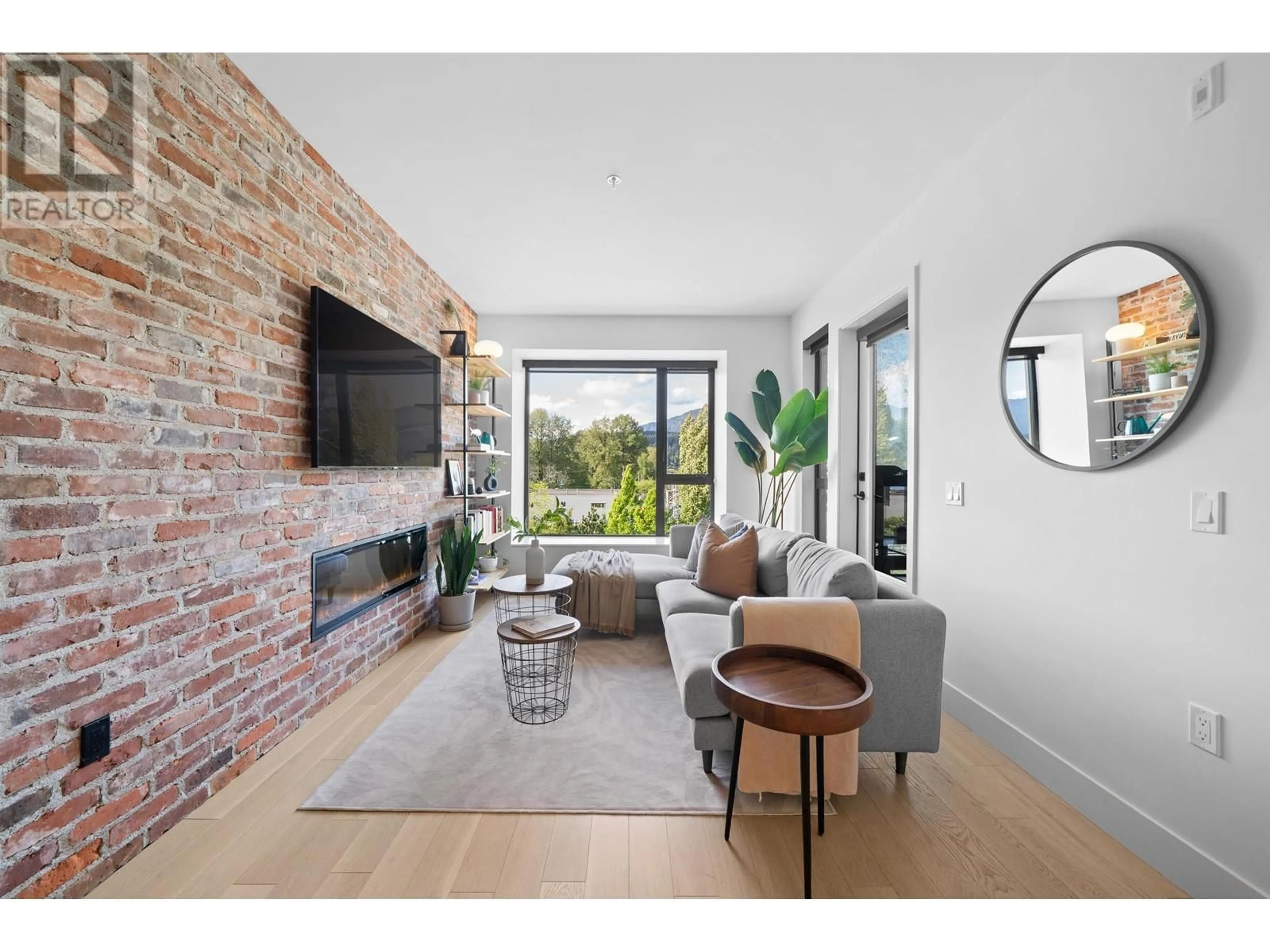 Living room with furniture, unknown for 203 - 83 MOODY STREET, Port Moody British Columbia V3H0K7