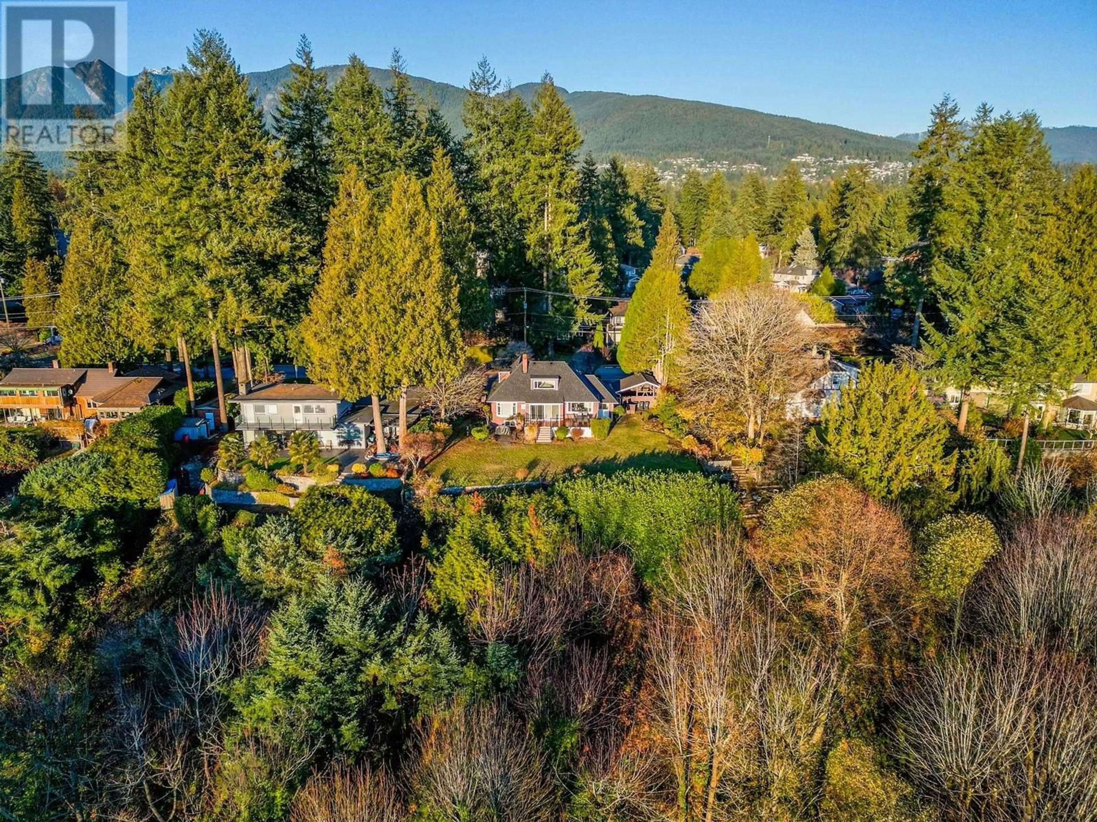 A pic from outside/outdoor area/front of a property/back of a property/a pic from drone, forest/trees view for 1275 KEITH ROAD, North Vancouver British Columbia V7P1Y9