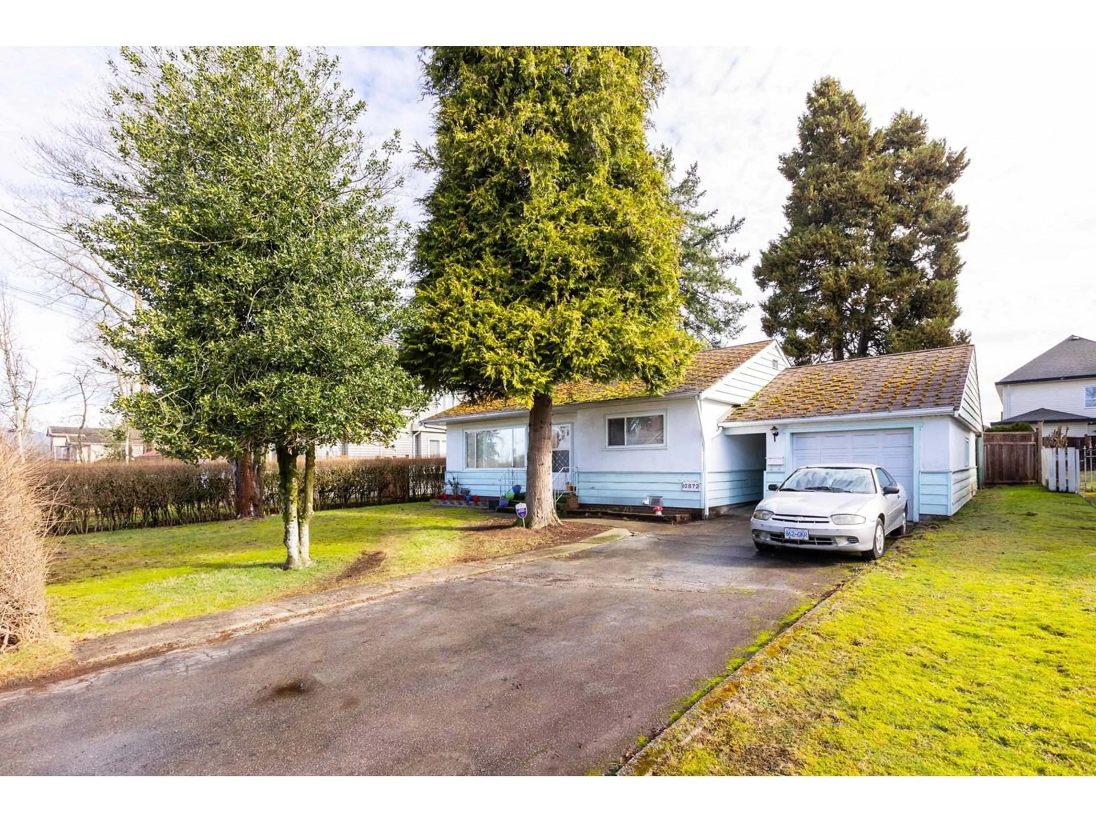 A pic from outside/outdoor area/front of a property/back of a property/a pic from drone, street for 10872 139A, Surrey British Columbia V3R3E5