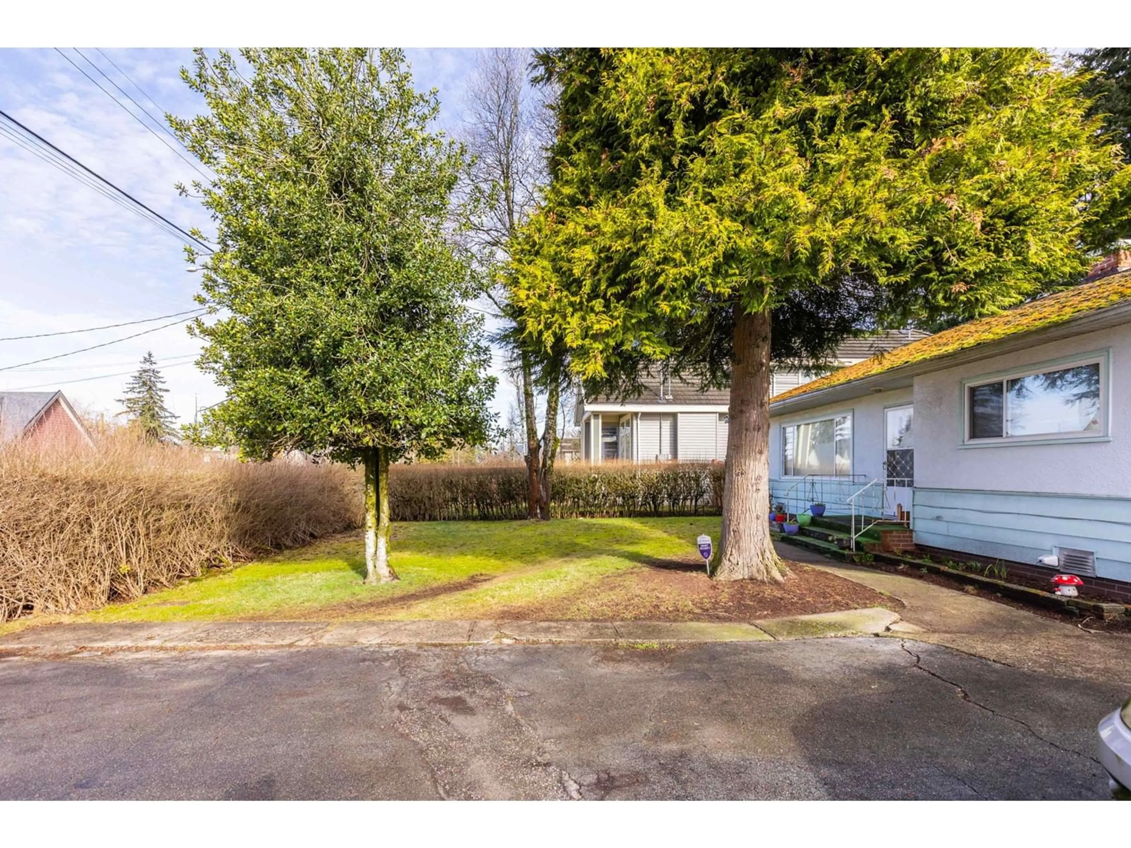 A pic from outside/outdoor area/front of a property/back of a property/a pic from drone, street for 10872 139A, Surrey British Columbia V3R3E5