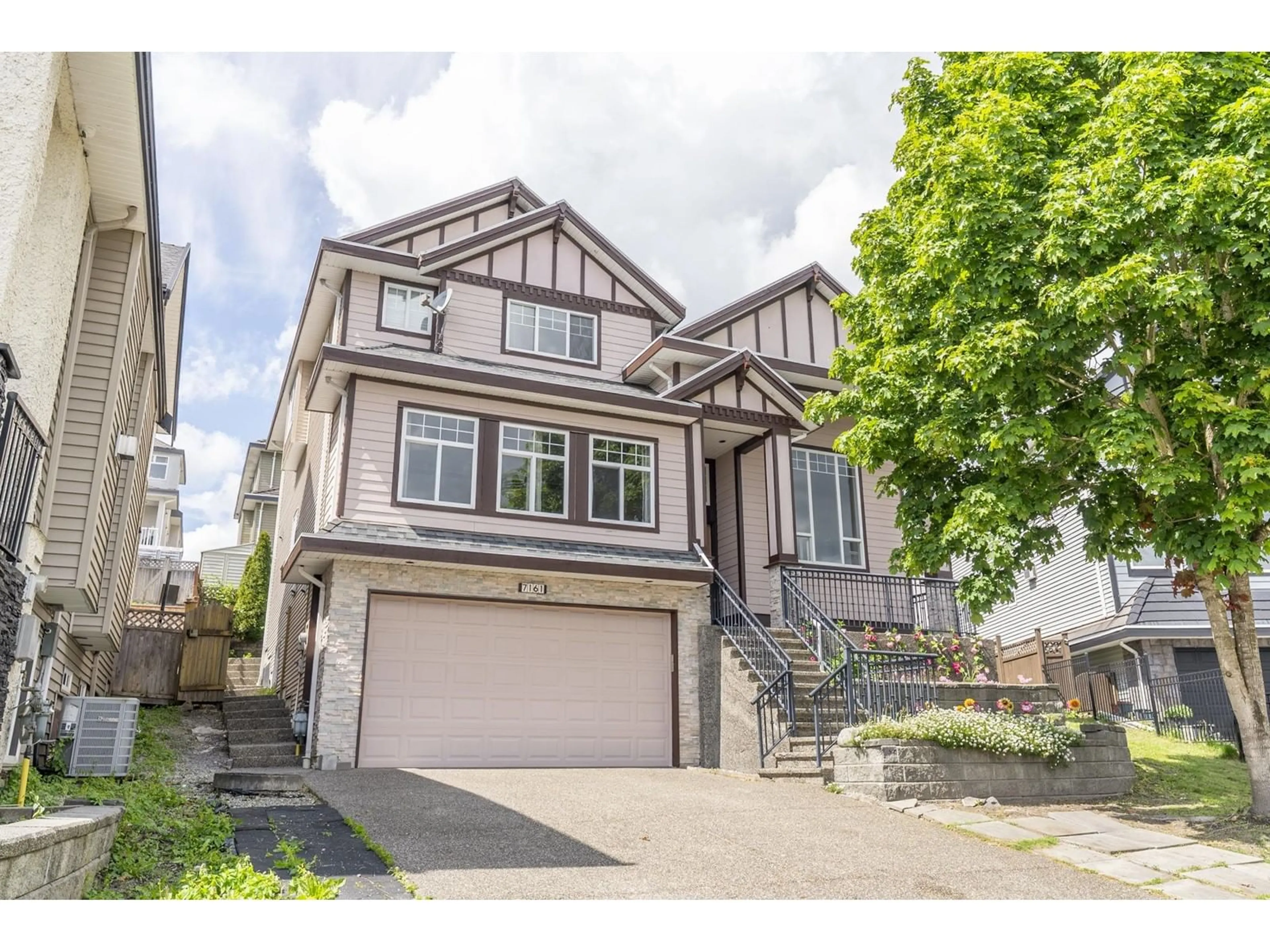 Home with vinyl exterior material, street for 7161 151, Surrey British Columbia V3S7Y8