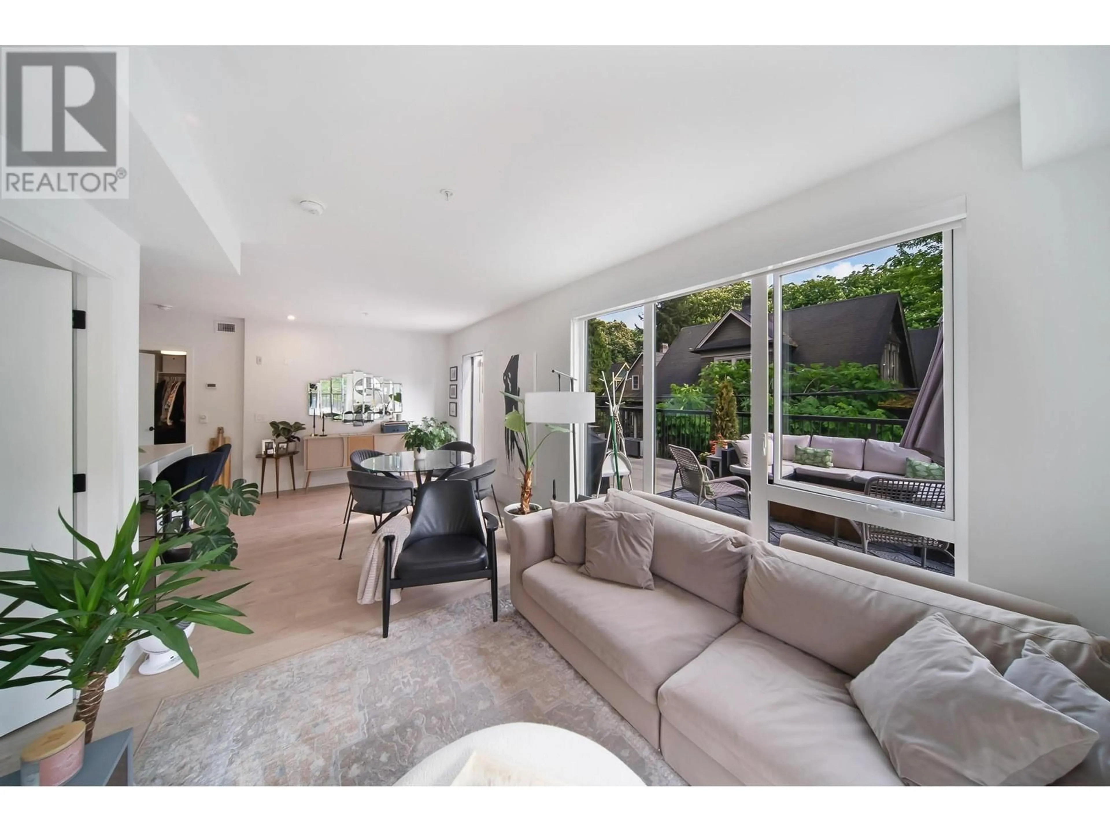 Living room with furniture, unknown for 221 - 2520 GUELPH STREET, Vancouver British Columbia V5T0K7