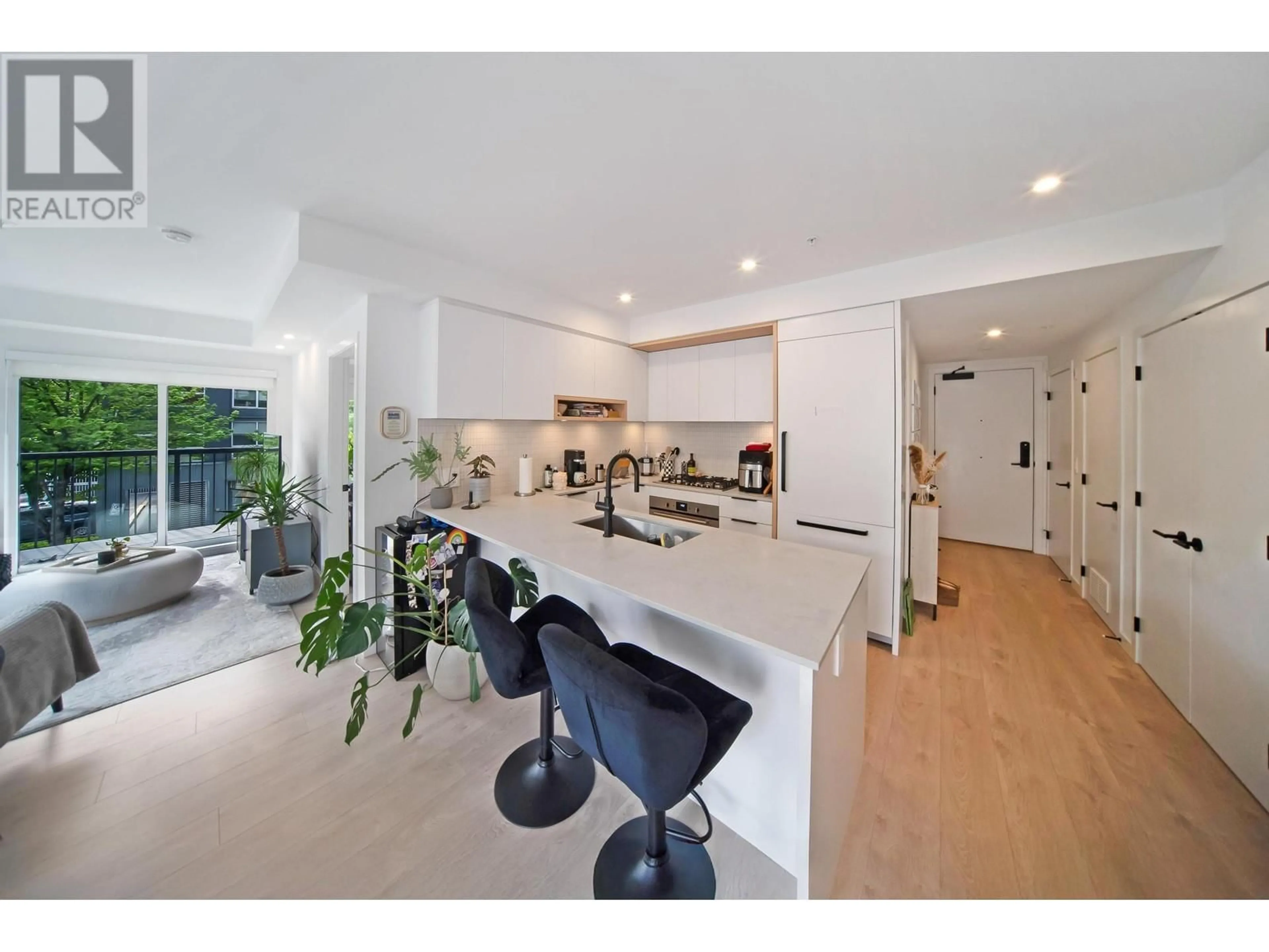 Open concept kitchen, unknown for 221 - 2520 GUELPH STREET, Vancouver British Columbia V5T0K7