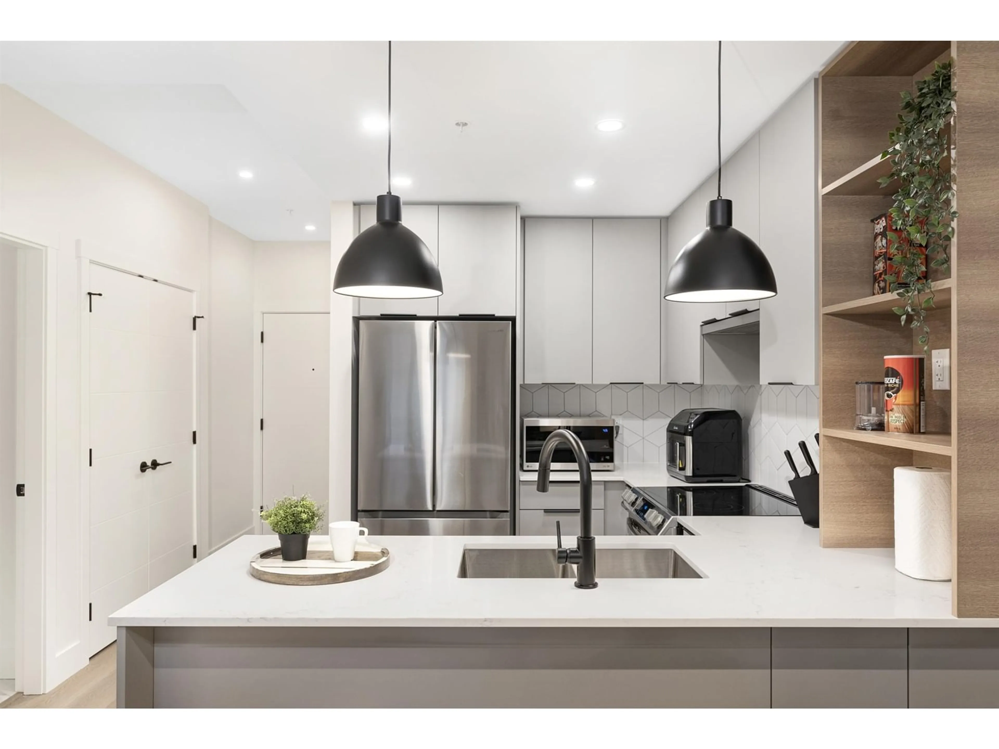 Contemporary kitchen, unknown for 211 - 10778 138, Surrey British Columbia V3T0S5