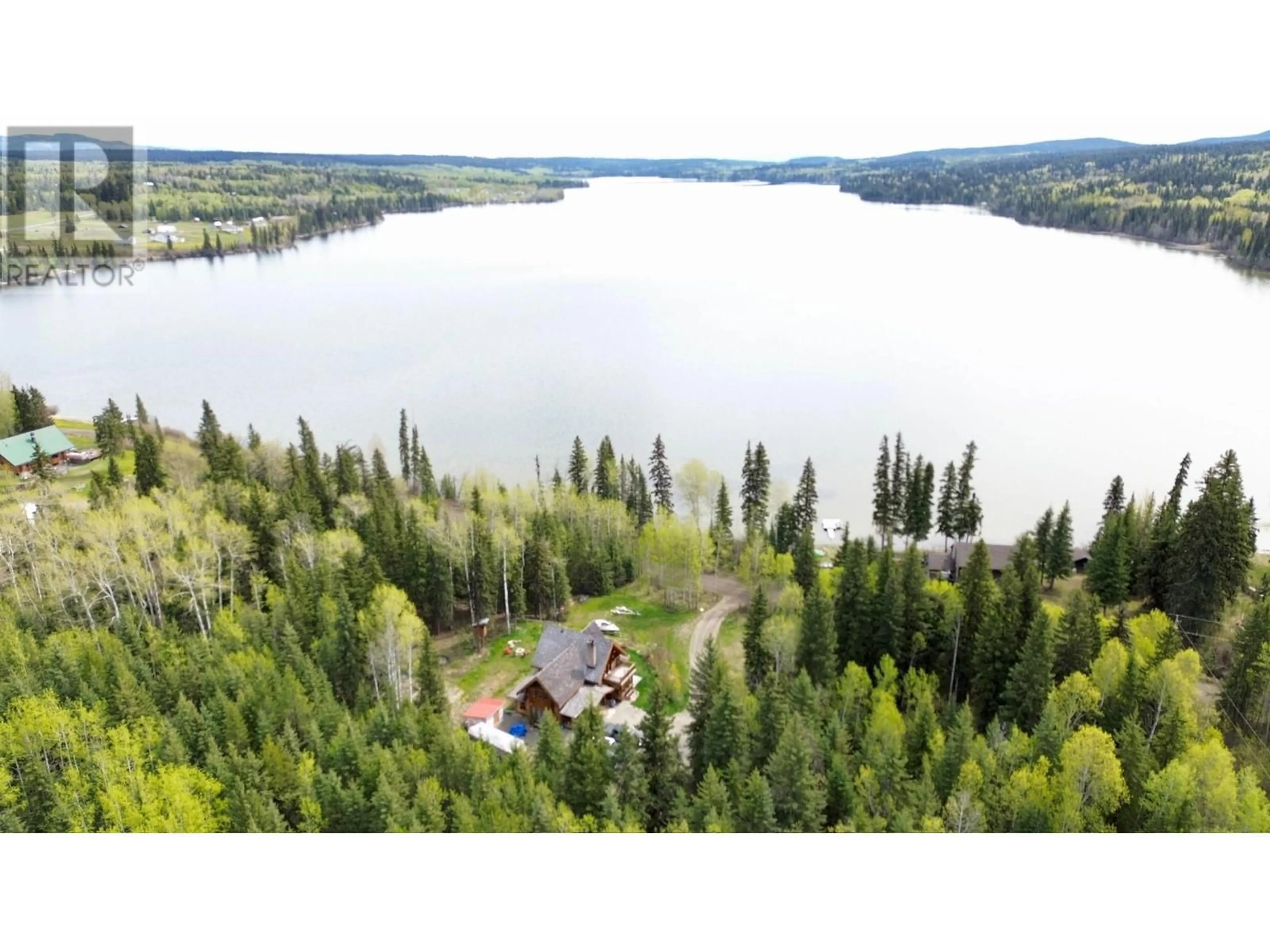 A pic from outside/outdoor area/front of a property/back of a property/a pic from drone, water/lake/river/ocean view for 4217 LAKEVIEW ROAD, Williams Lake British Columbia V0K1G0