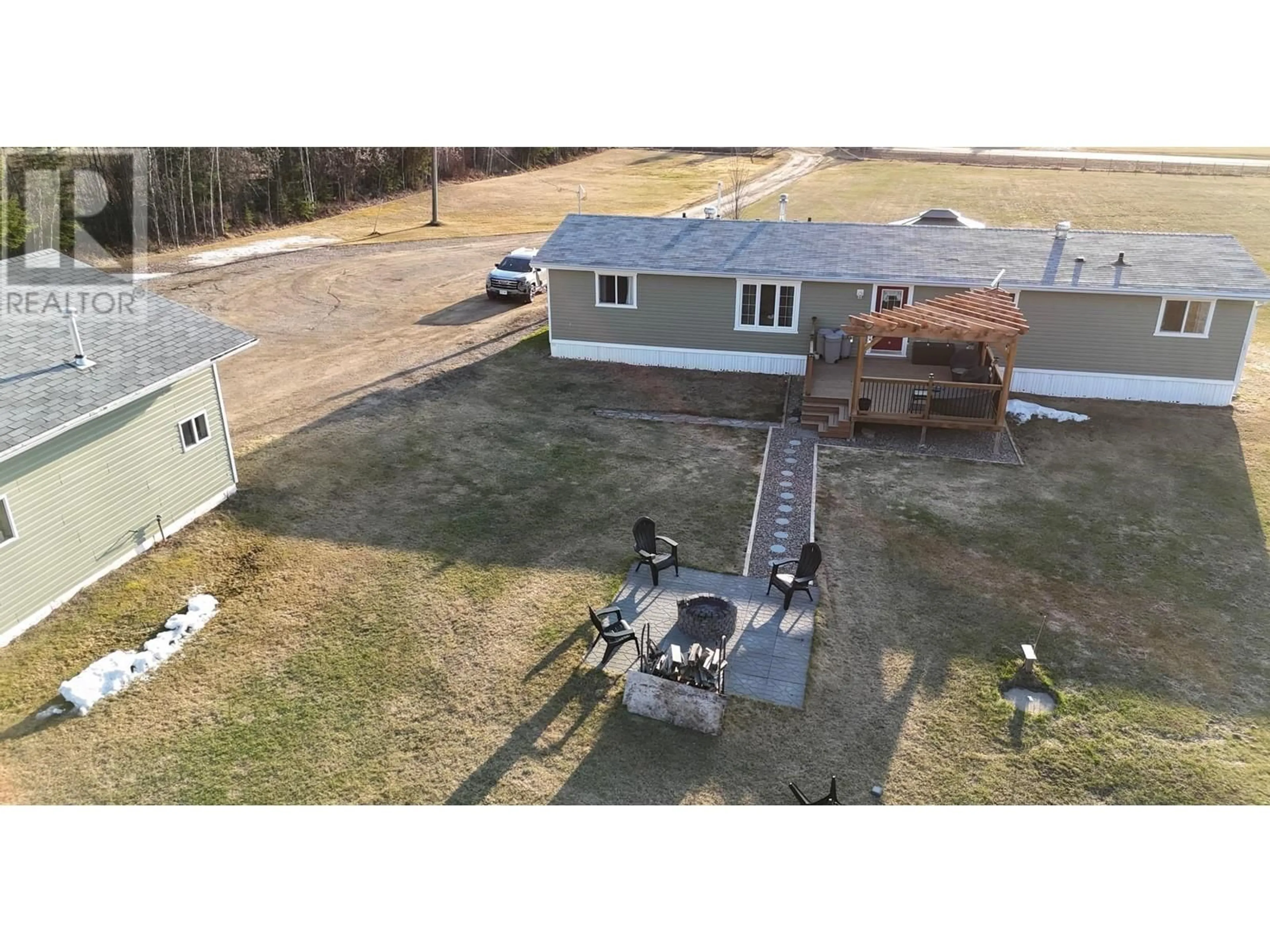 A pic from outside/outdoor area/front of a property/back of a property/a pic from drone, building for 51 PEBBLE DRIVE, Fort Nelson - Remote British Columbia V0C1R0