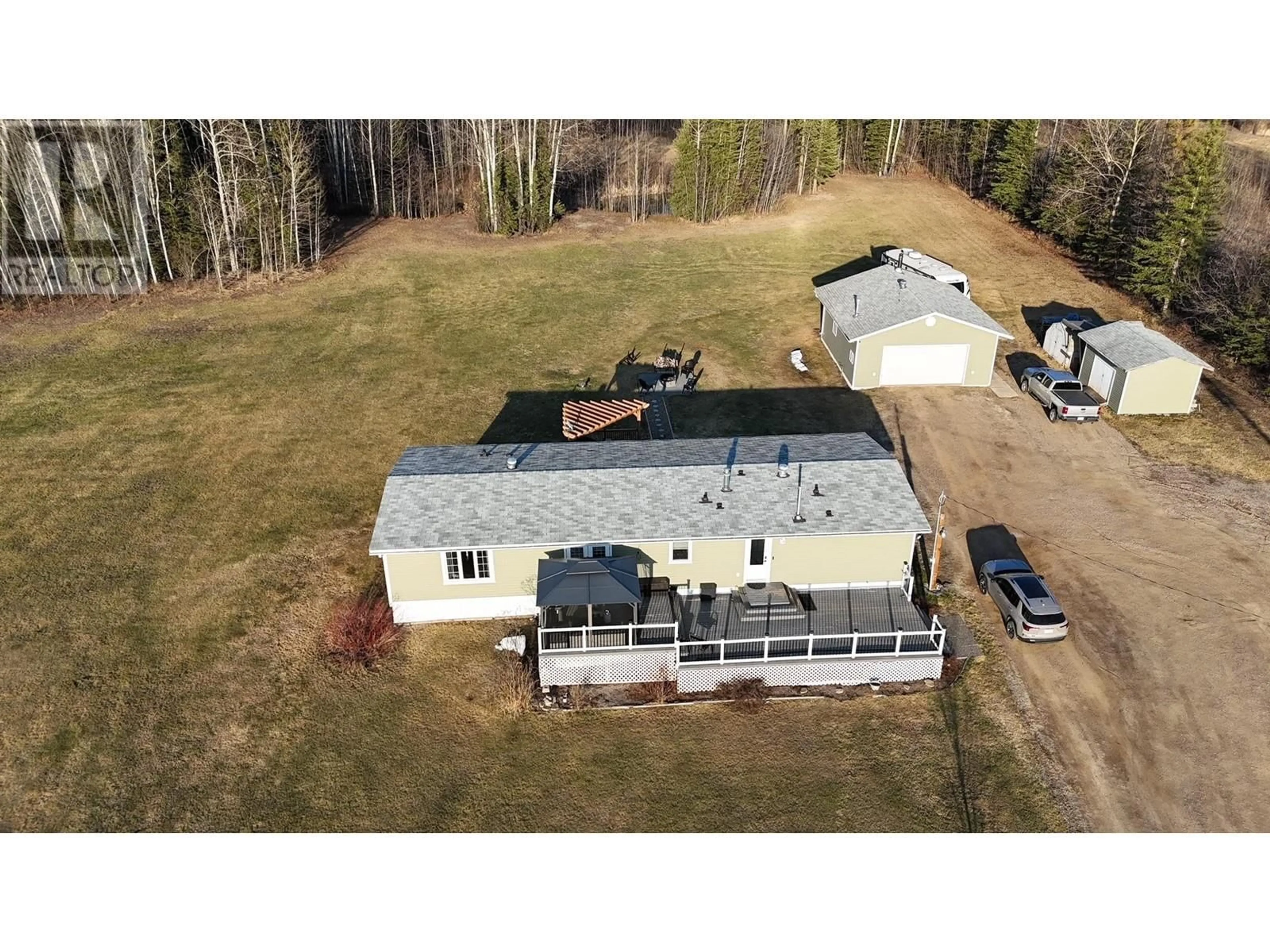 A pic from outside/outdoor area/front of a property/back of a property/a pic from drone, building for 51 PEBBLE DRIVE, Fort Nelson - Remote British Columbia V0C1R0