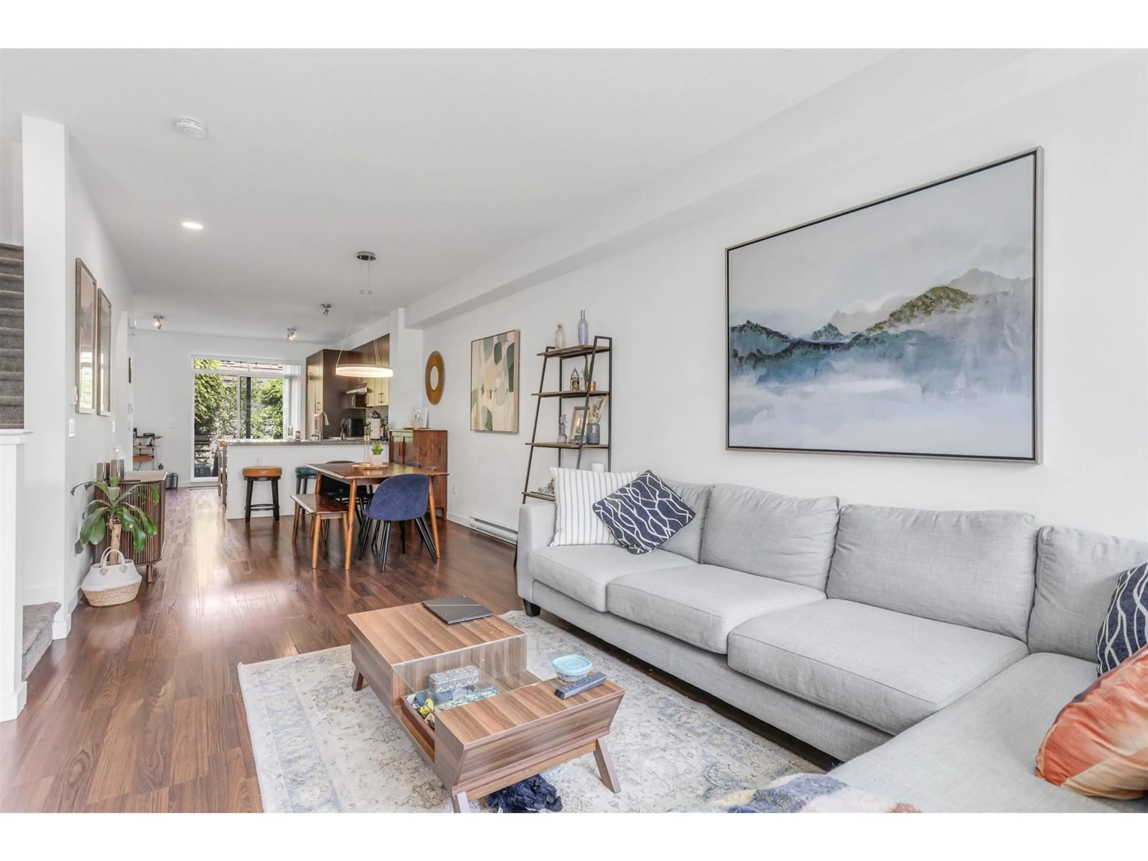 Living room with furniture, wood/laminate floor for 115 - 2729 158, Surrey British Columbia V3Z1P4