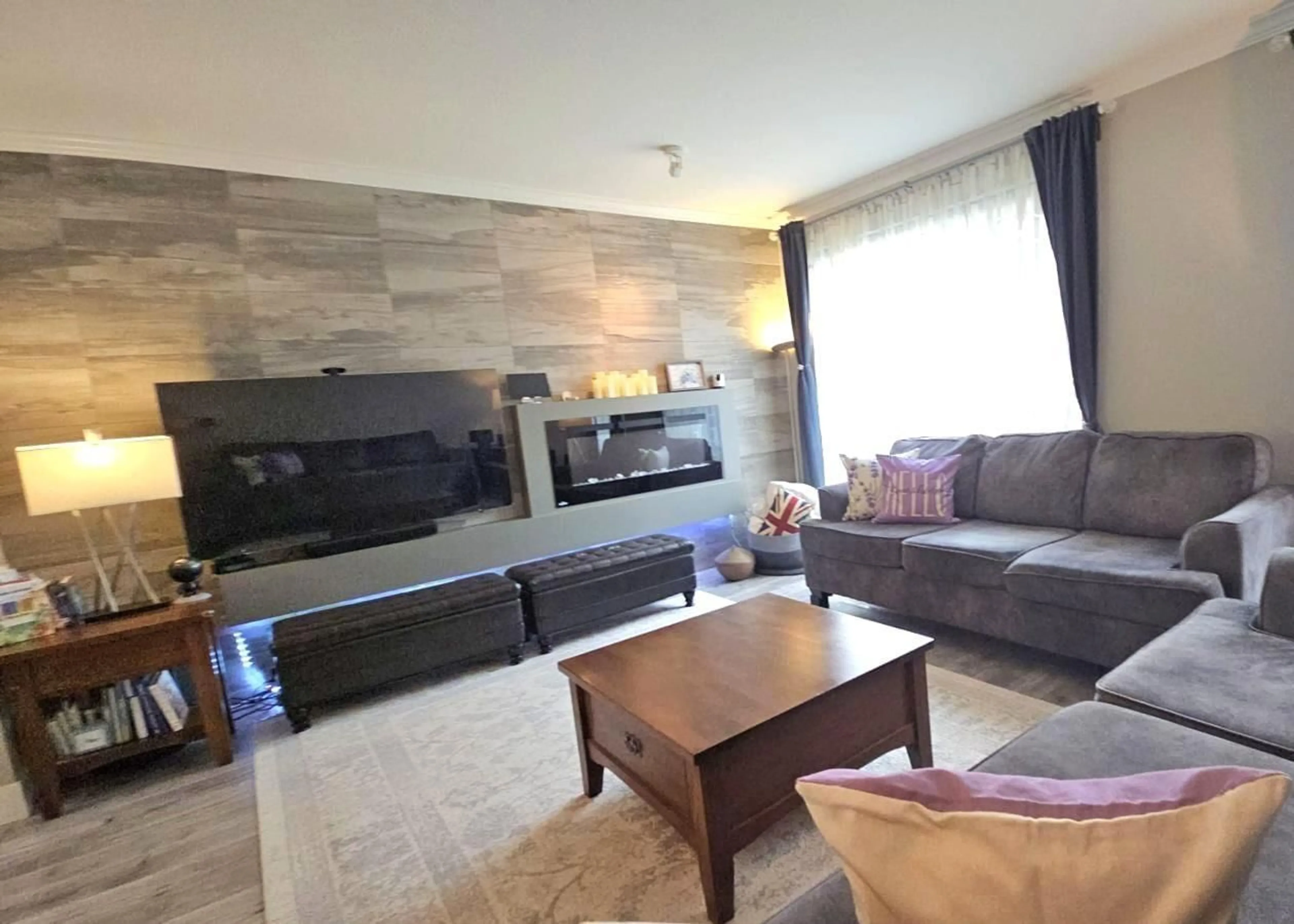 Living room with furniture, wood/laminate floor for 148 - 16488 64, Surrey British Columbia V3S6X6