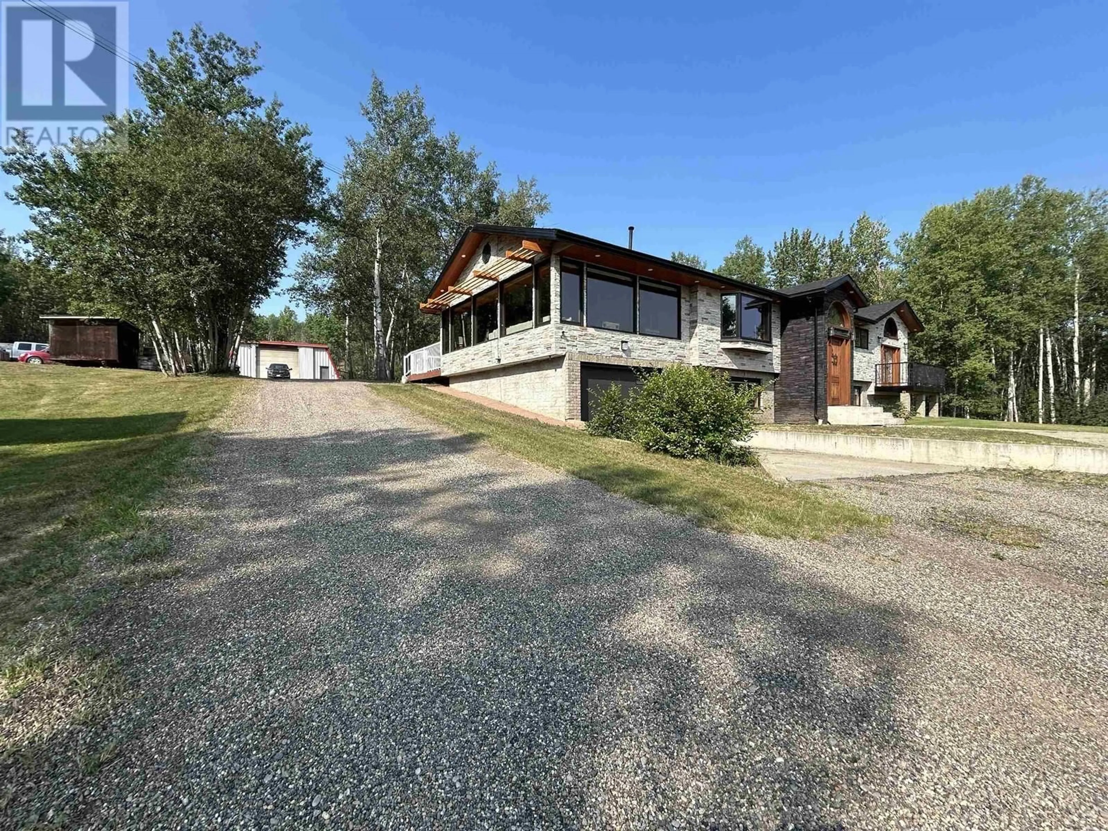 A pic from outside/outdoor area/front of a property/back of a property/a pic from drone, unknown for 13370 CHARLIE LAKE CRESCENT, Charlie Lake British Columbia V0C1H0