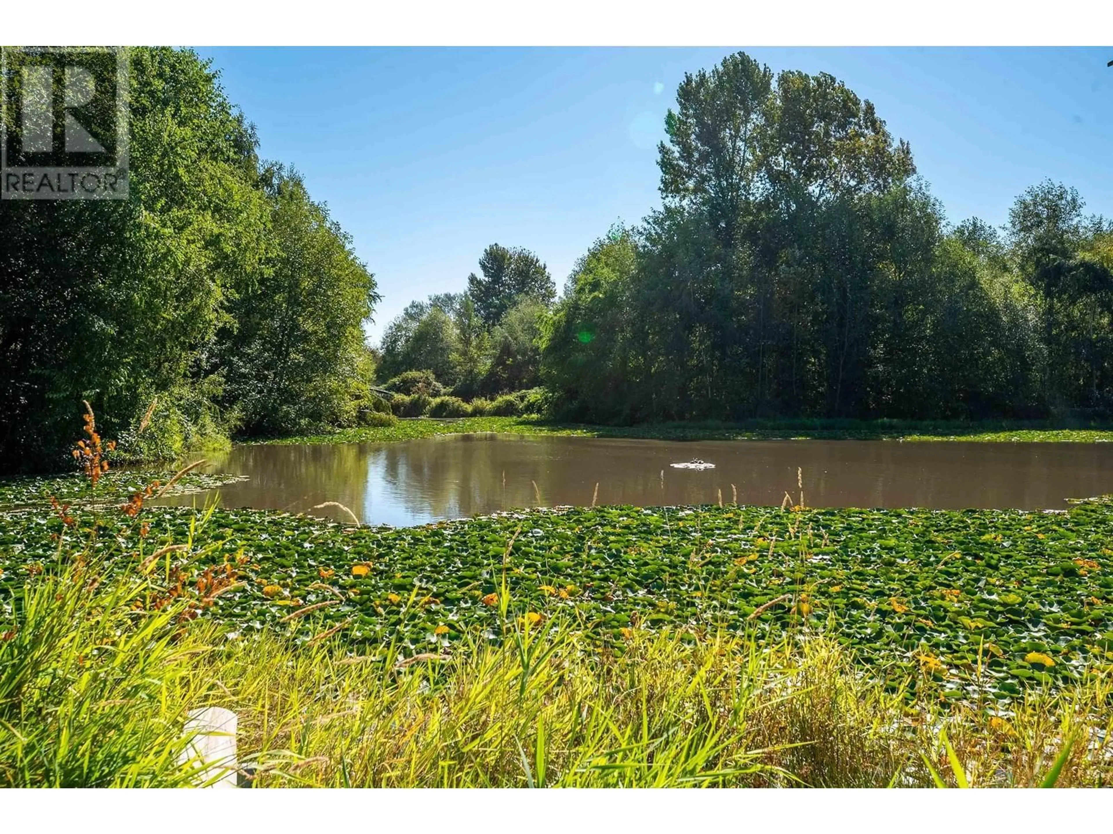 A pic from outside/outdoor area/front of a property/back of a property/a pic from drone, water/lake/river/ocean view for 210 - 9333 ALBERTA ROAD, Richmond British Columbia V6Y4E4