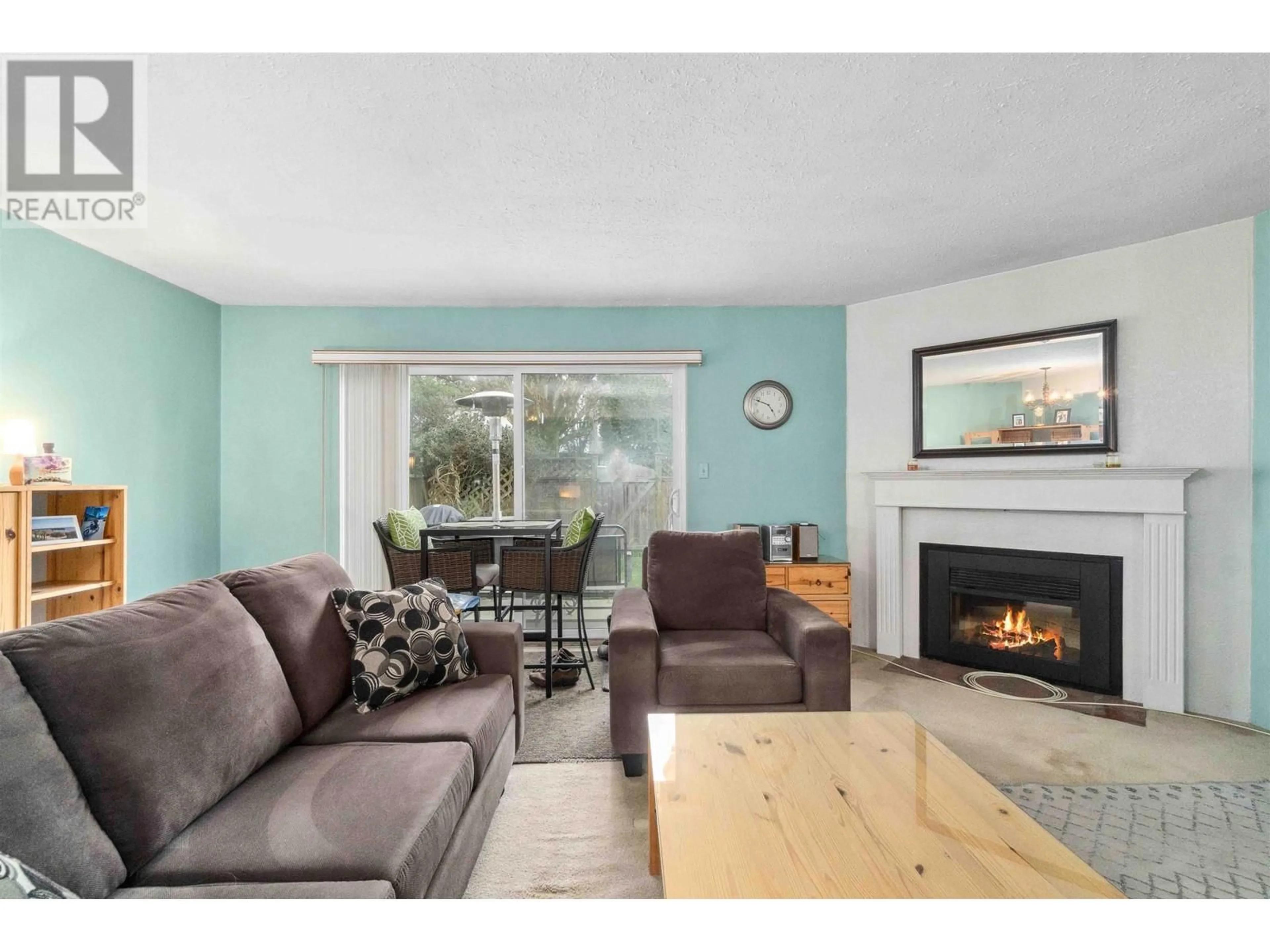 Living room with furniture, wood/laminate floor for 34 - 6111 TIFFANY BOULEVARD, Richmond British Columbia V7C4Y7
