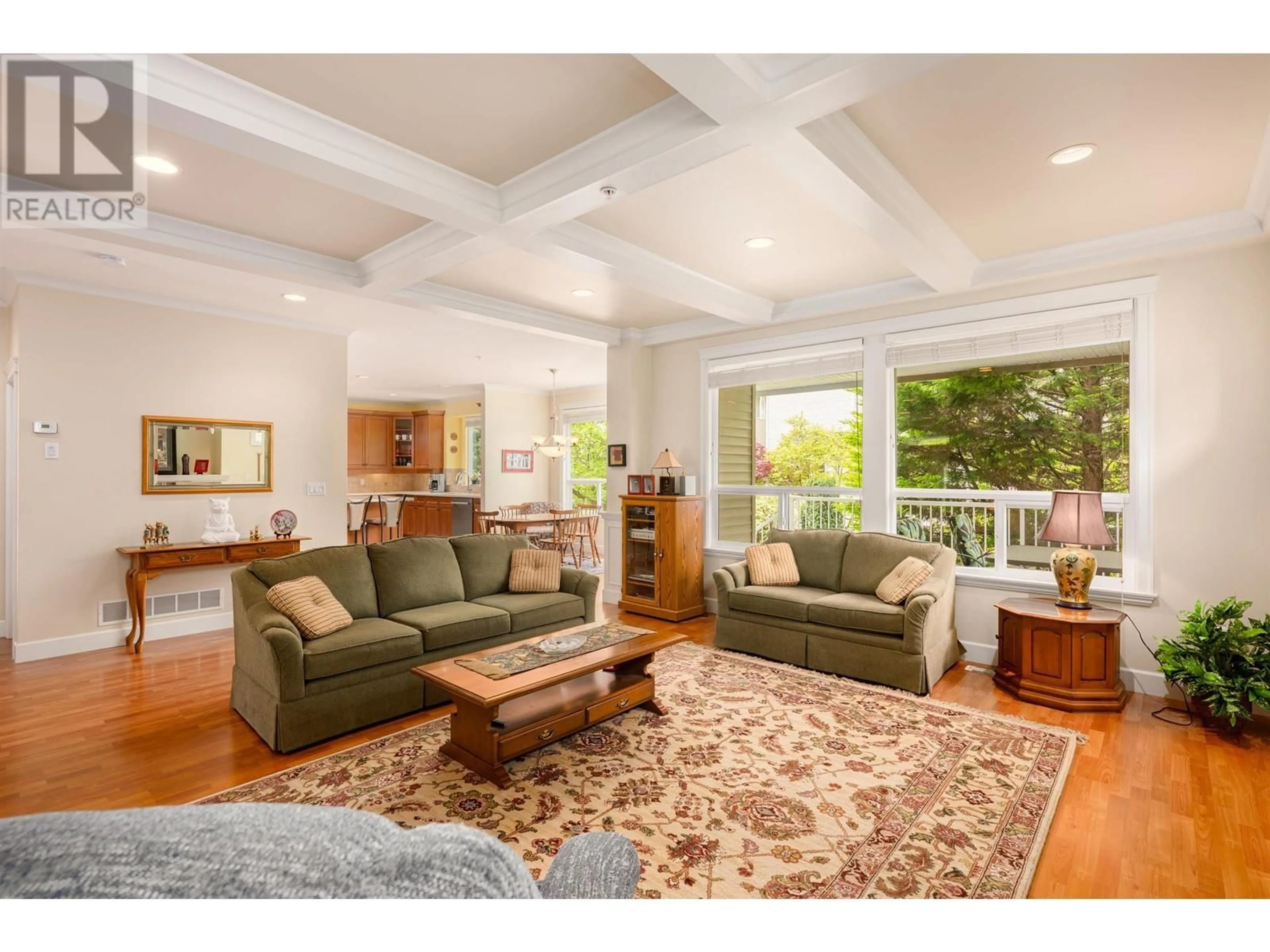 Living room with furniture, wood/laminate floor for 11271 SOUTHGATE ROAD, Pitt Meadows British Columbia V3Y2W3