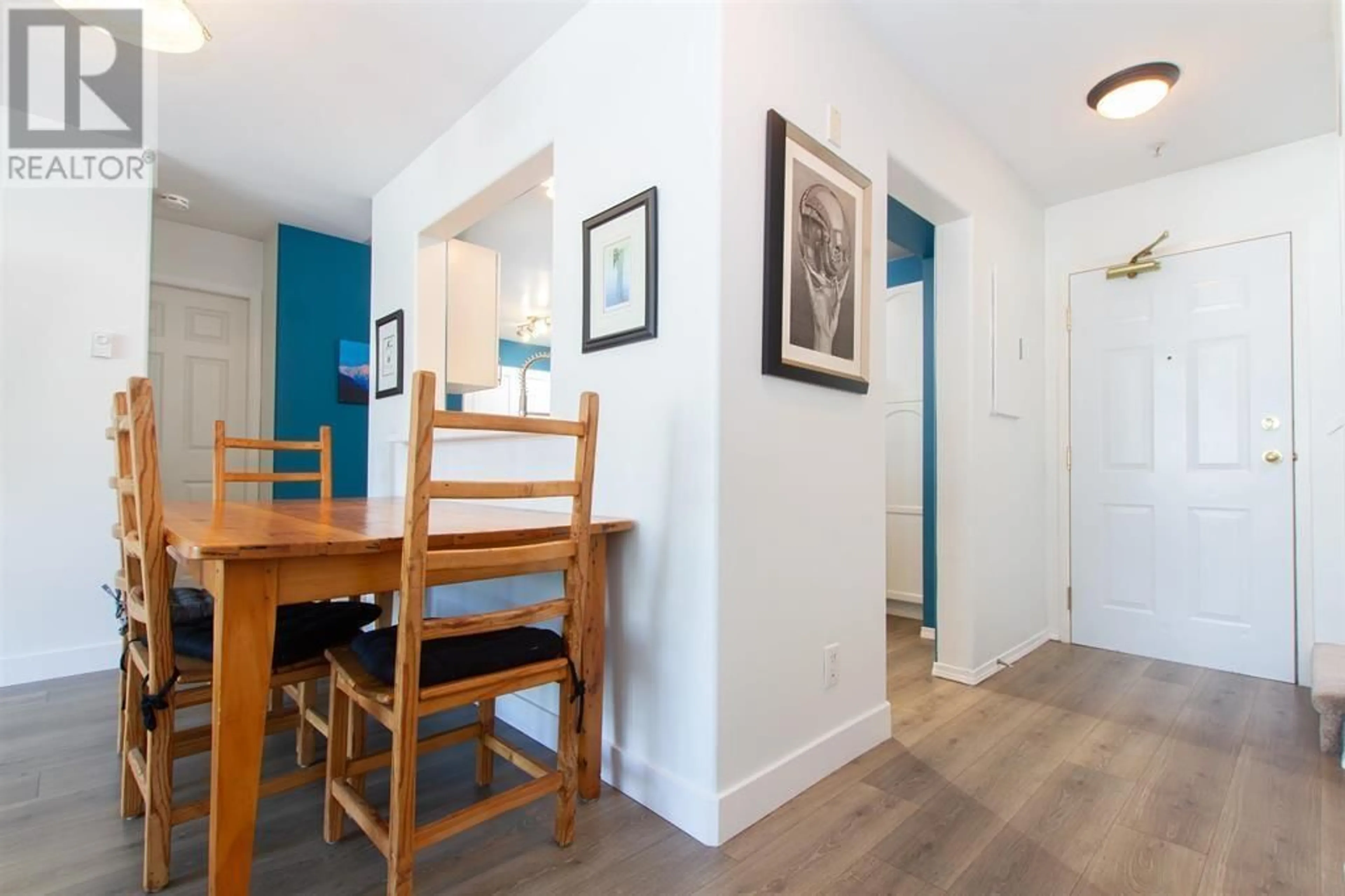Dining room, wood/laminate floor for 304 - 1466 PEMBERTON AVENUE, Squamish British Columbia V8B0K1
