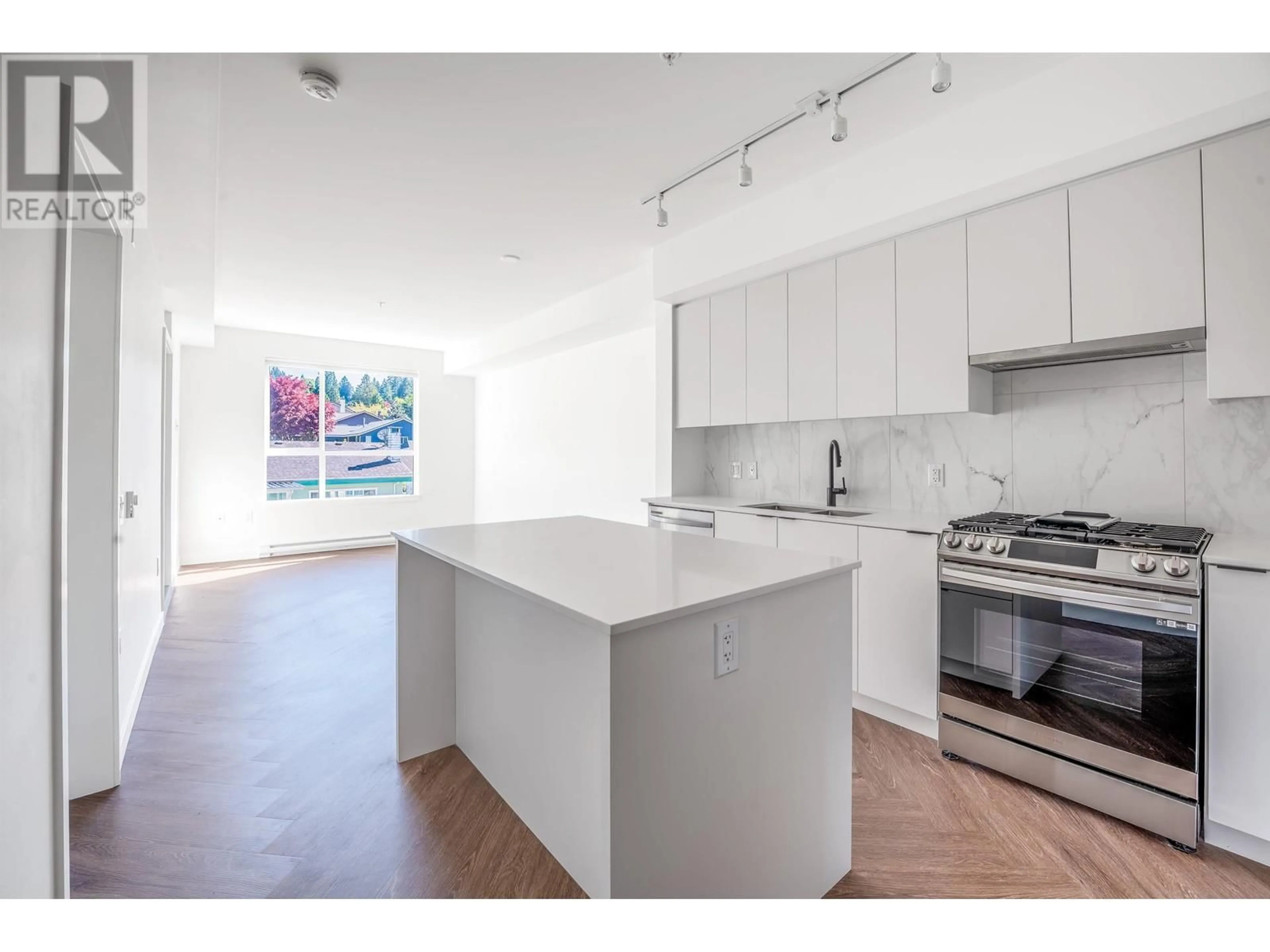 Open concept kitchen, unknown for 524 - 3229 ST. JOHNS STREET, Port Moody British Columbia V3H0M4