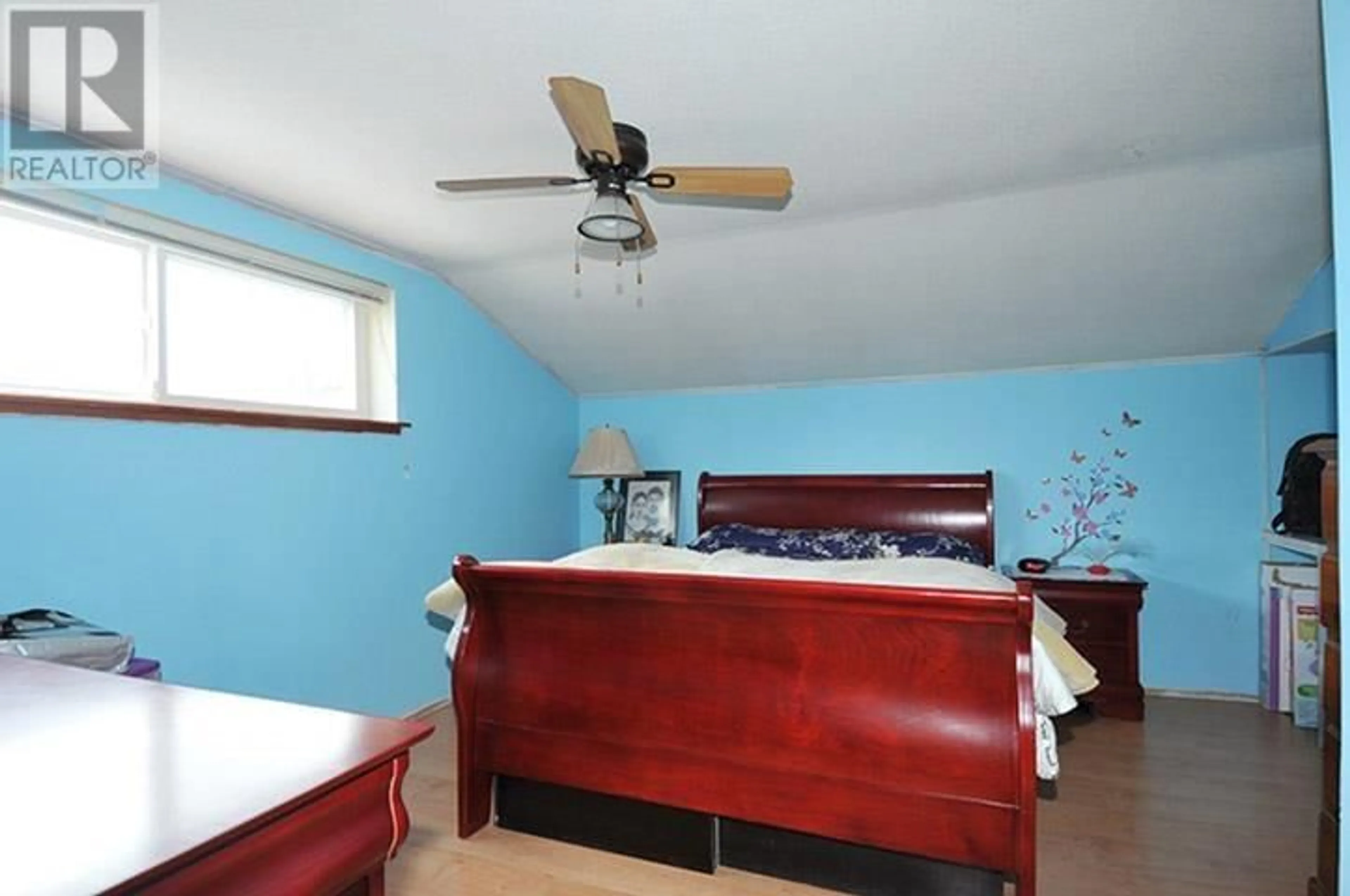 Bedroom with bed, wood/laminate floor for 12275 HILLSIDE STREET, Maple Ridge British Columbia V2X5W9