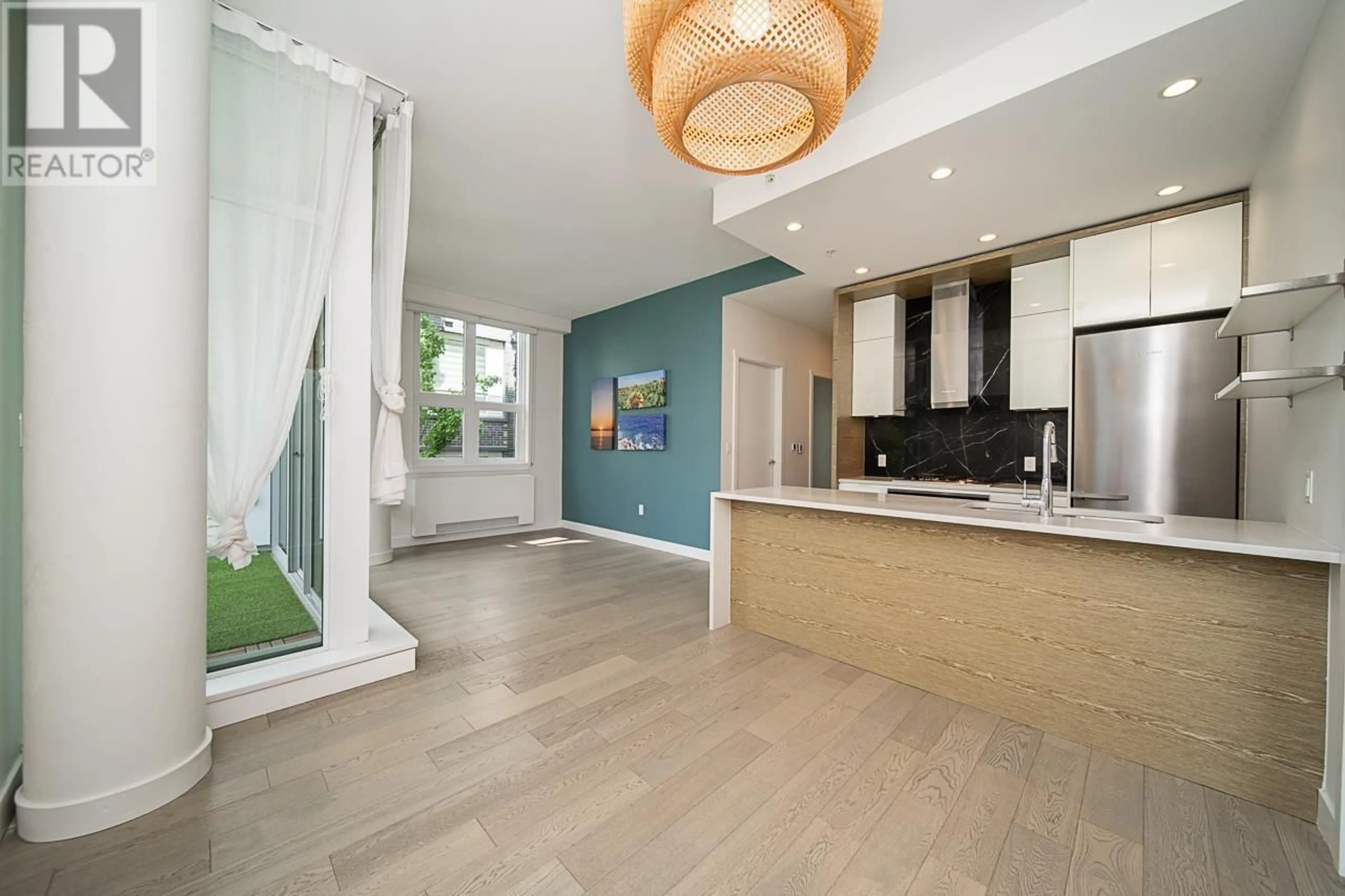 Open concept kitchen, ceramic/tile floor for 201 - 6733 CAMBIE STREET, Vancouver British Columbia V6P3H1