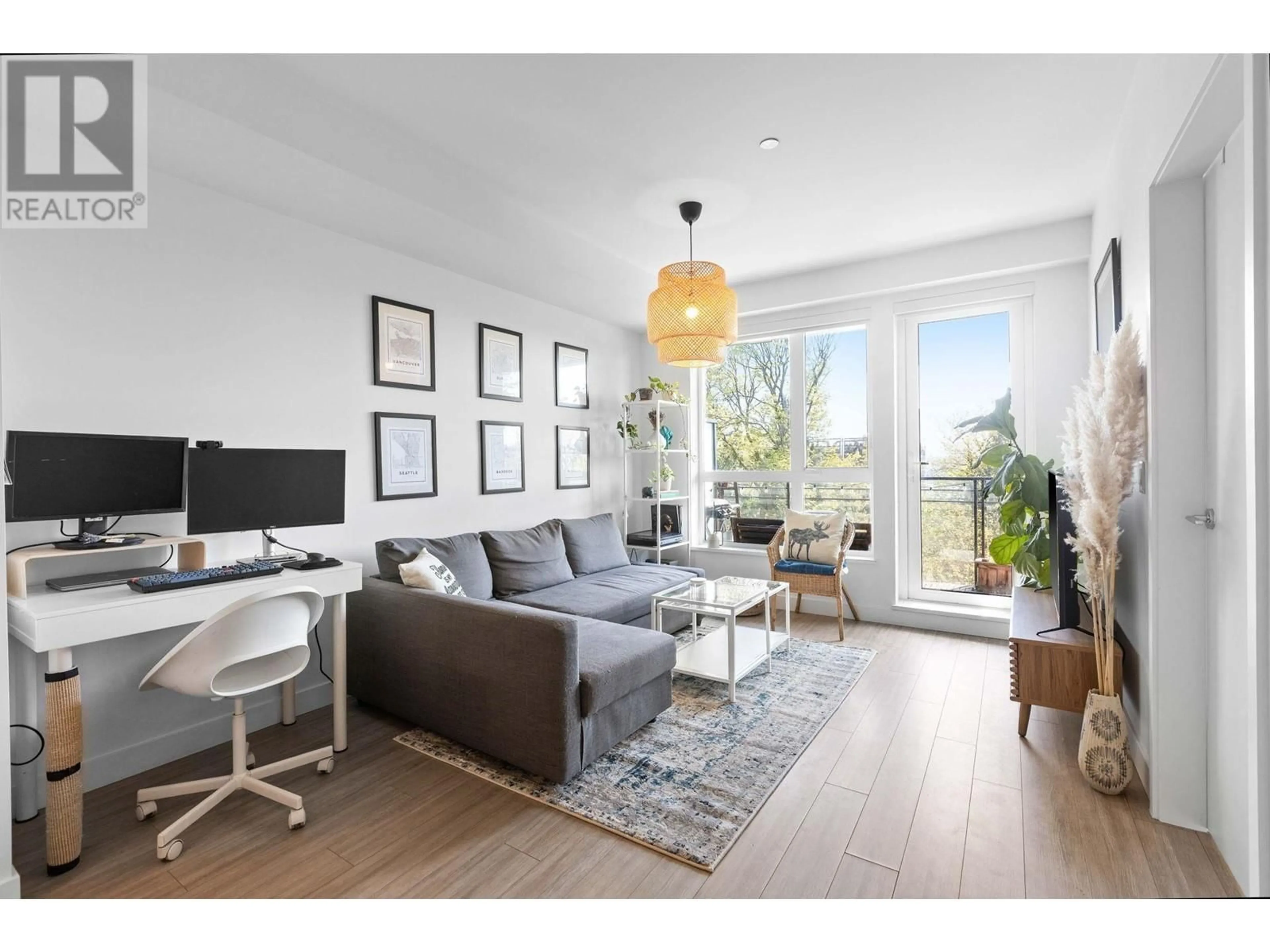 Living room with furniture, wood/laminate floor for 309 - 747 3RD STREET, North Vancouver British Columbia V7L1G8