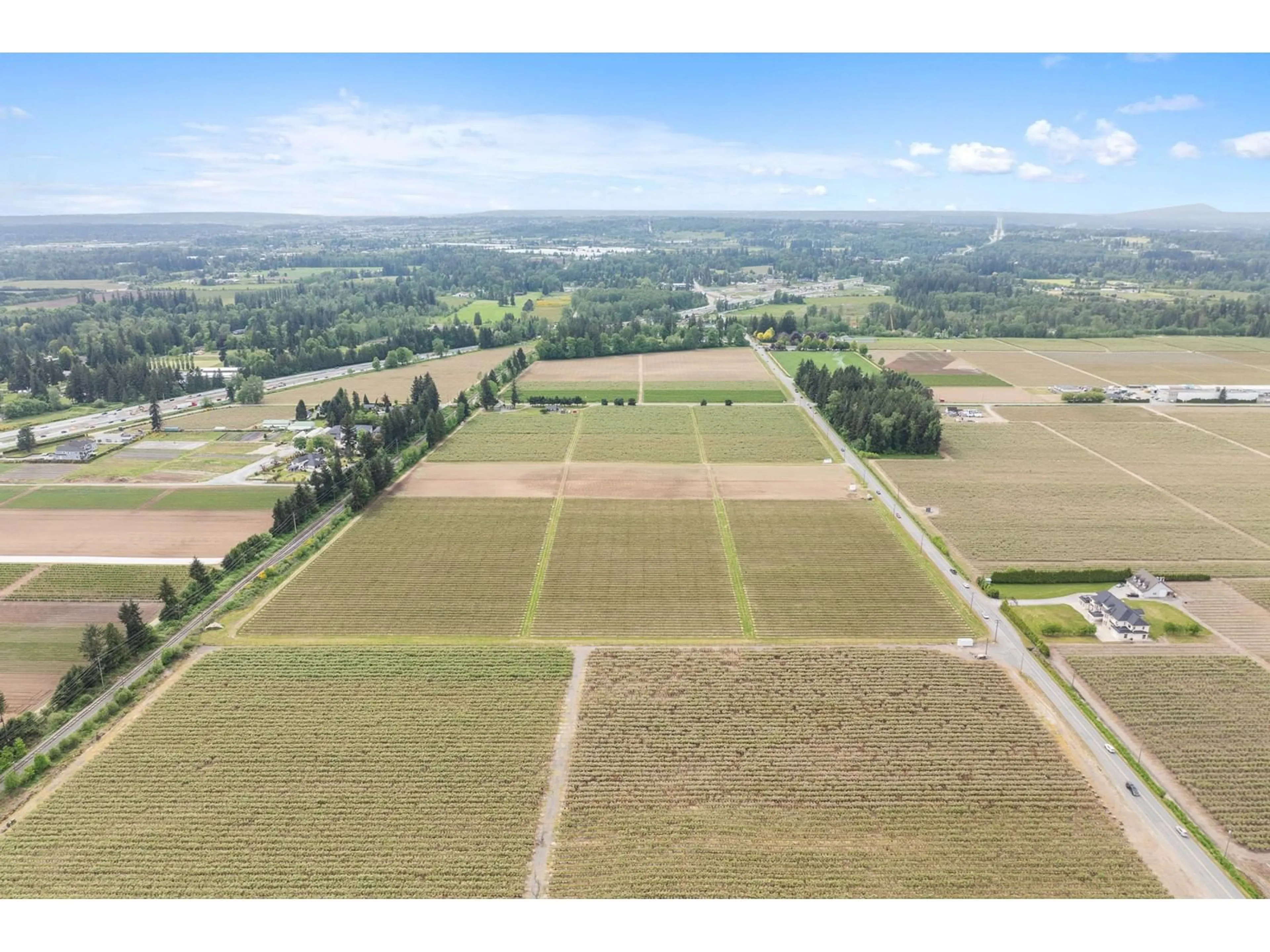 A pic from outside/outdoor area/front of a property/back of a property/a pic from drone, water/lake/river/ocean view for 7060 240, Langley British Columbia V1M3P8