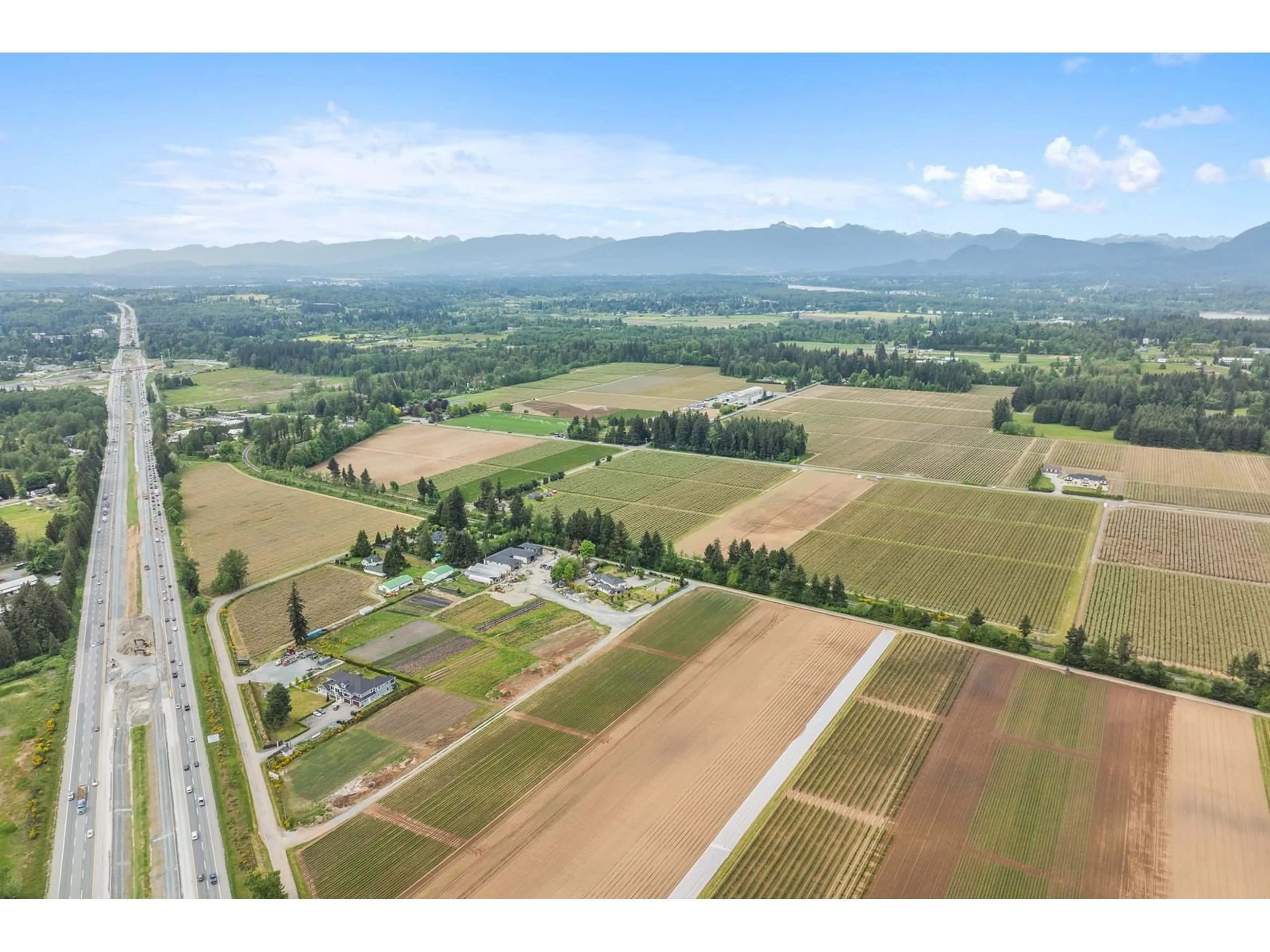 A pic from outside/outdoor area/front of a property/back of a property/a pic from drone, mountain view for 7060 240, Langley British Columbia V1M3P8
