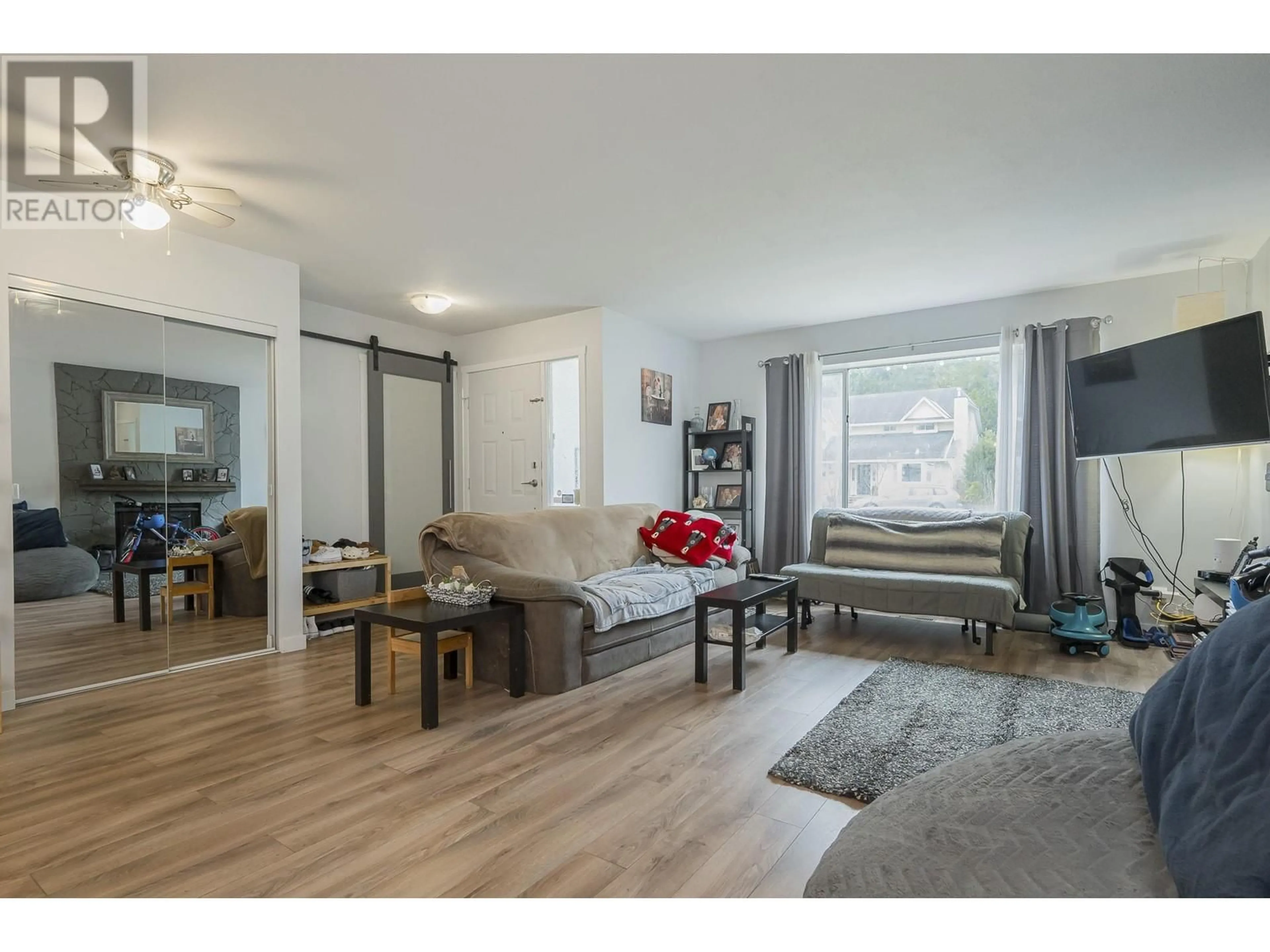 Living room with furniture, wood/laminate floor for 12145 207A STREET, Maple Ridge British Columbia V2X9T1