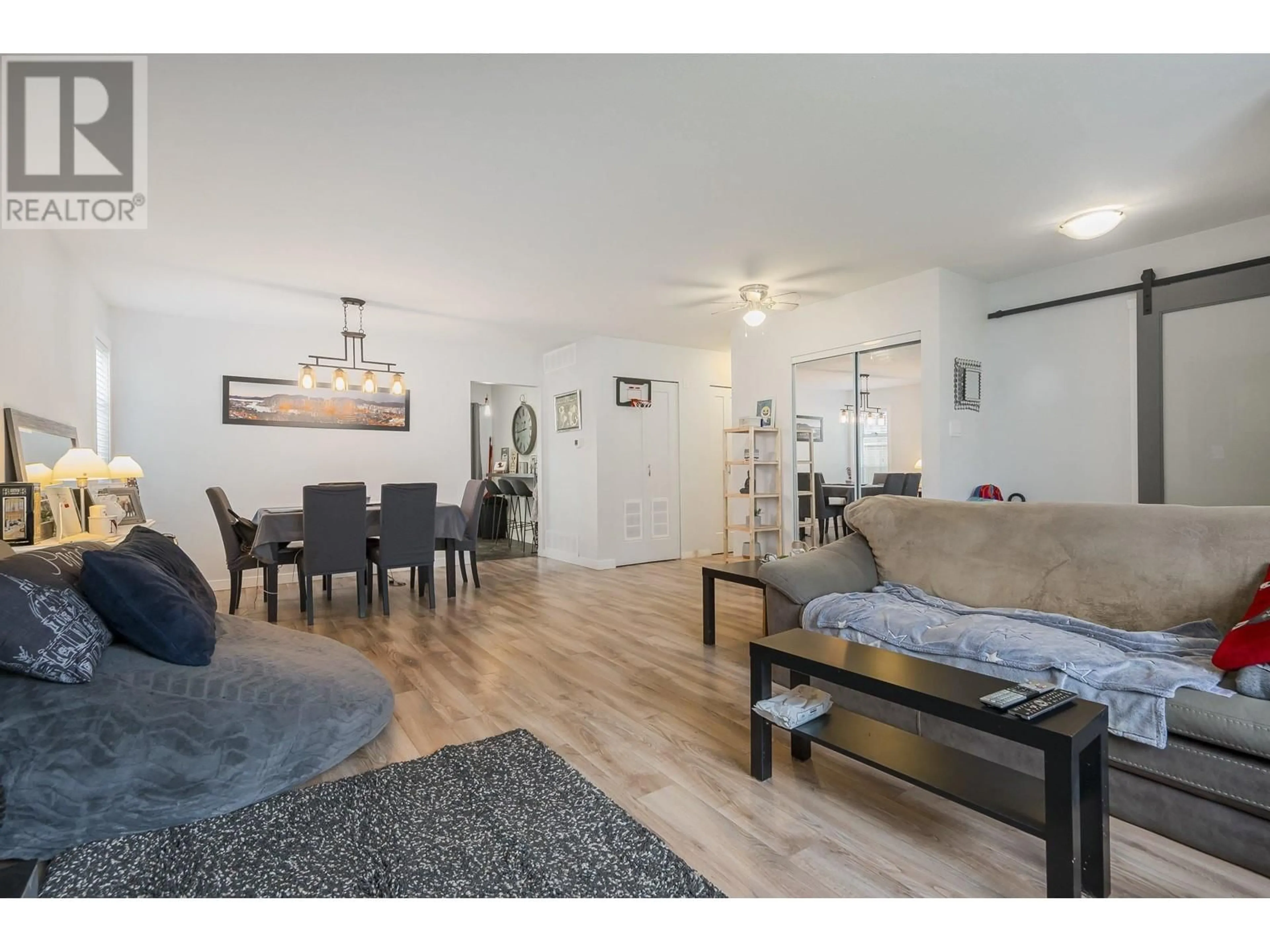 Living room with furniture, wood/laminate floor for 12145 207A STREET, Maple Ridge British Columbia V2X9T1