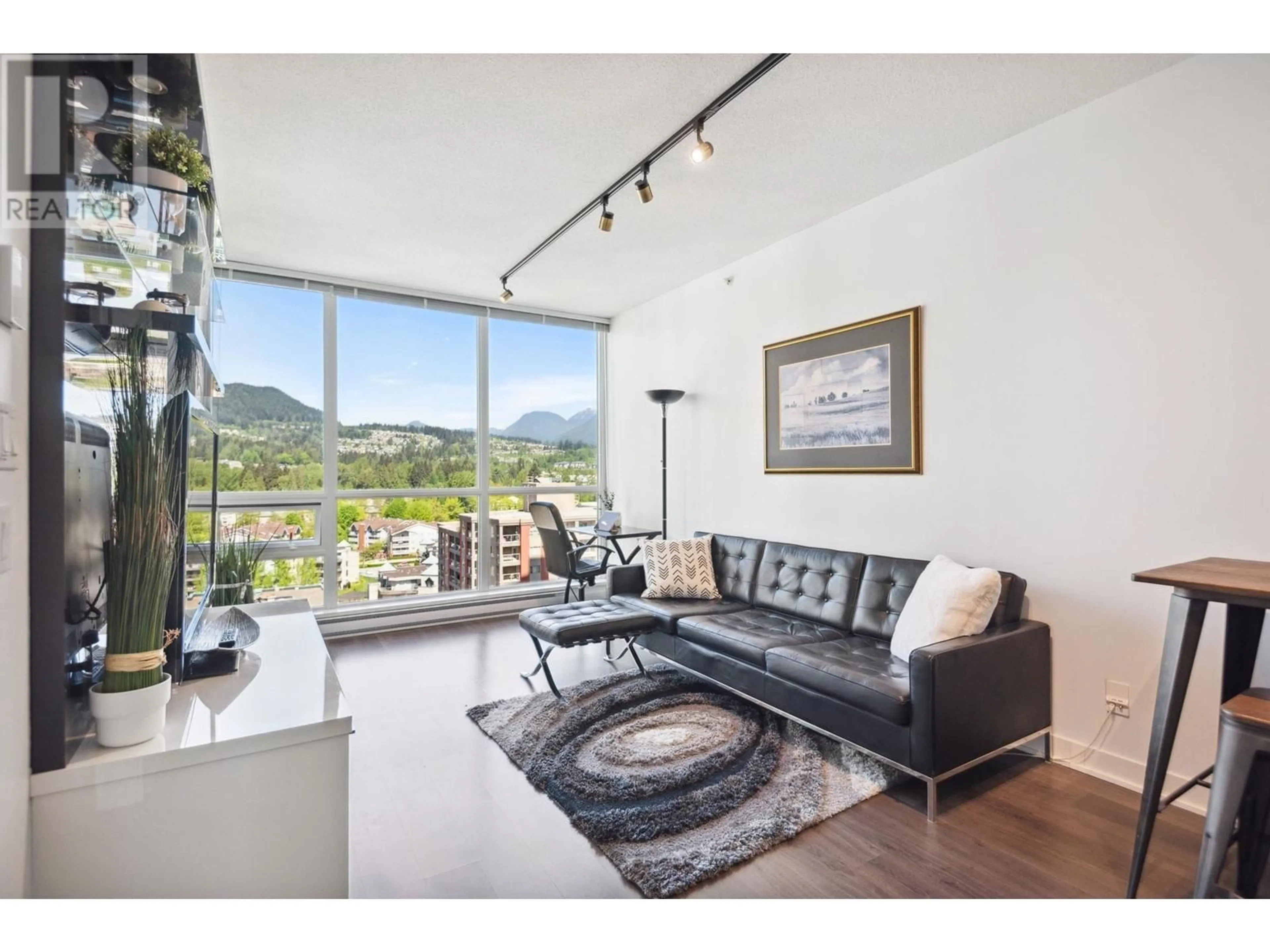 Living room with furniture, wood/laminate floor for 1709 - 2975 ATLANTIC AVENUE, Coquitlam British Columbia V3B0C6