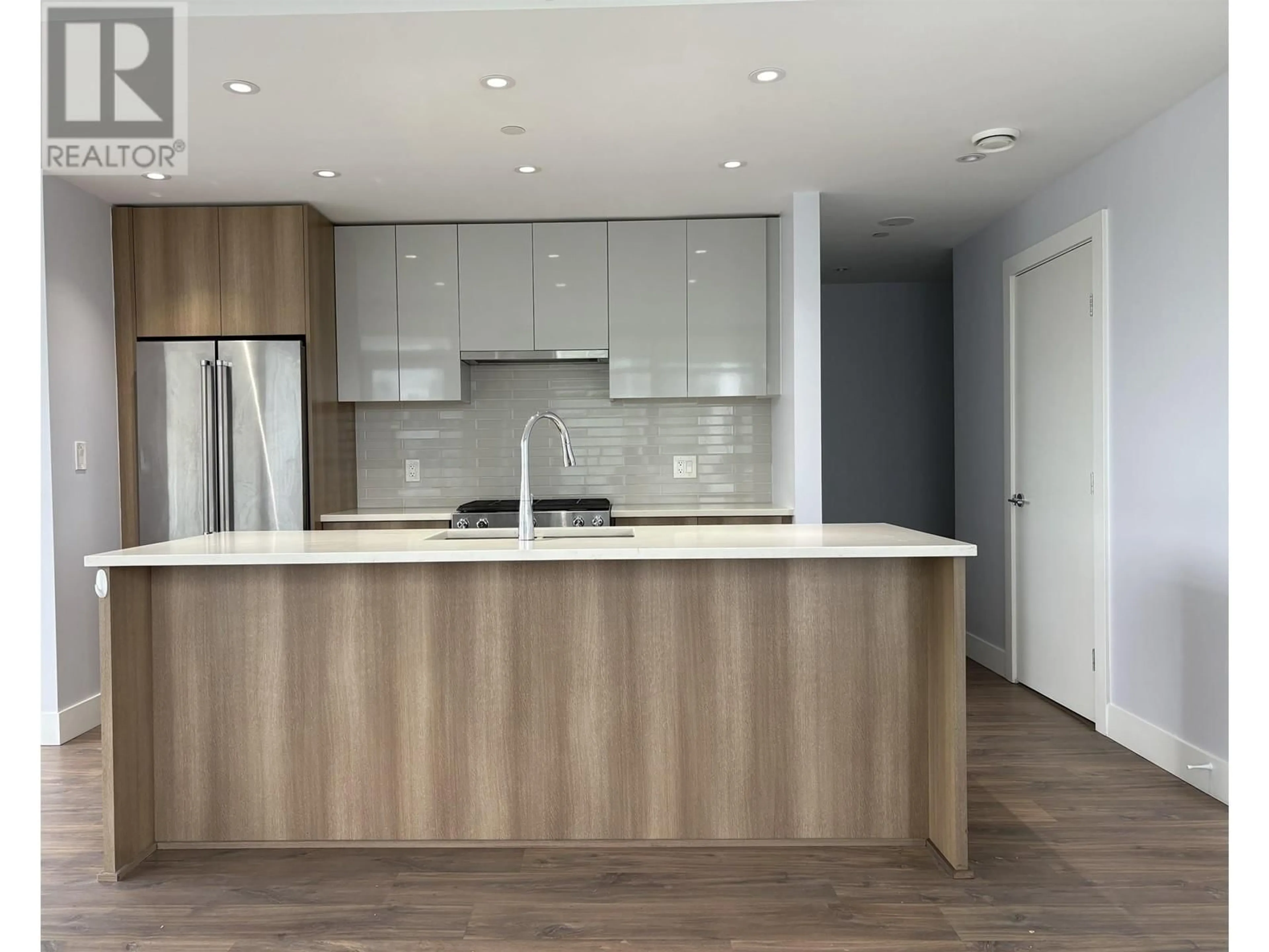 Open concept kitchen, wood/laminate floor for 1202 - 258 NELSON'S COURT, New Westminster British Columbia V3L0E9