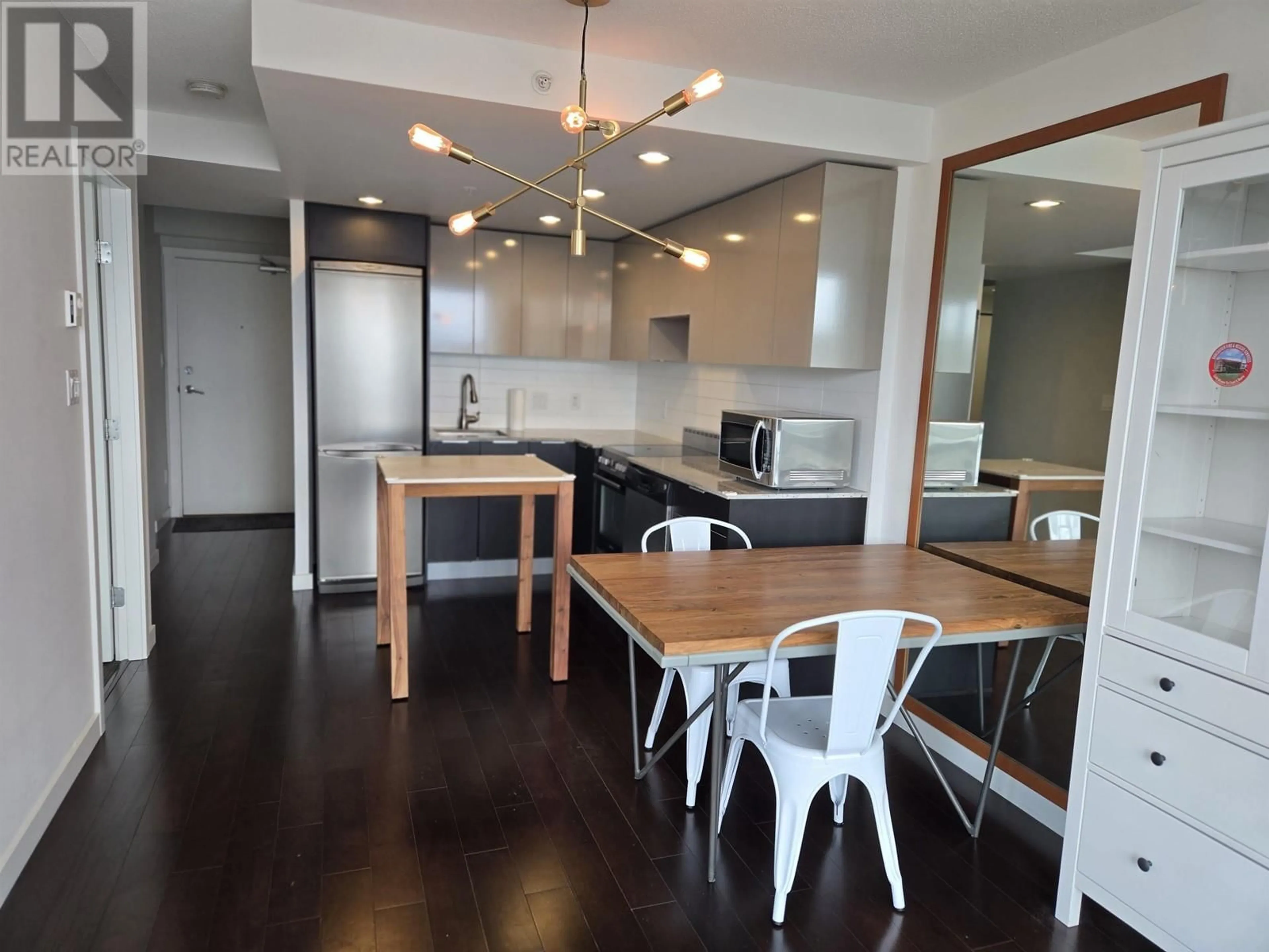 Open concept kitchen, wood/laminate floor for 1008 - 445 2ND AVENUE, Vancouver British Columbia V5Y0E8