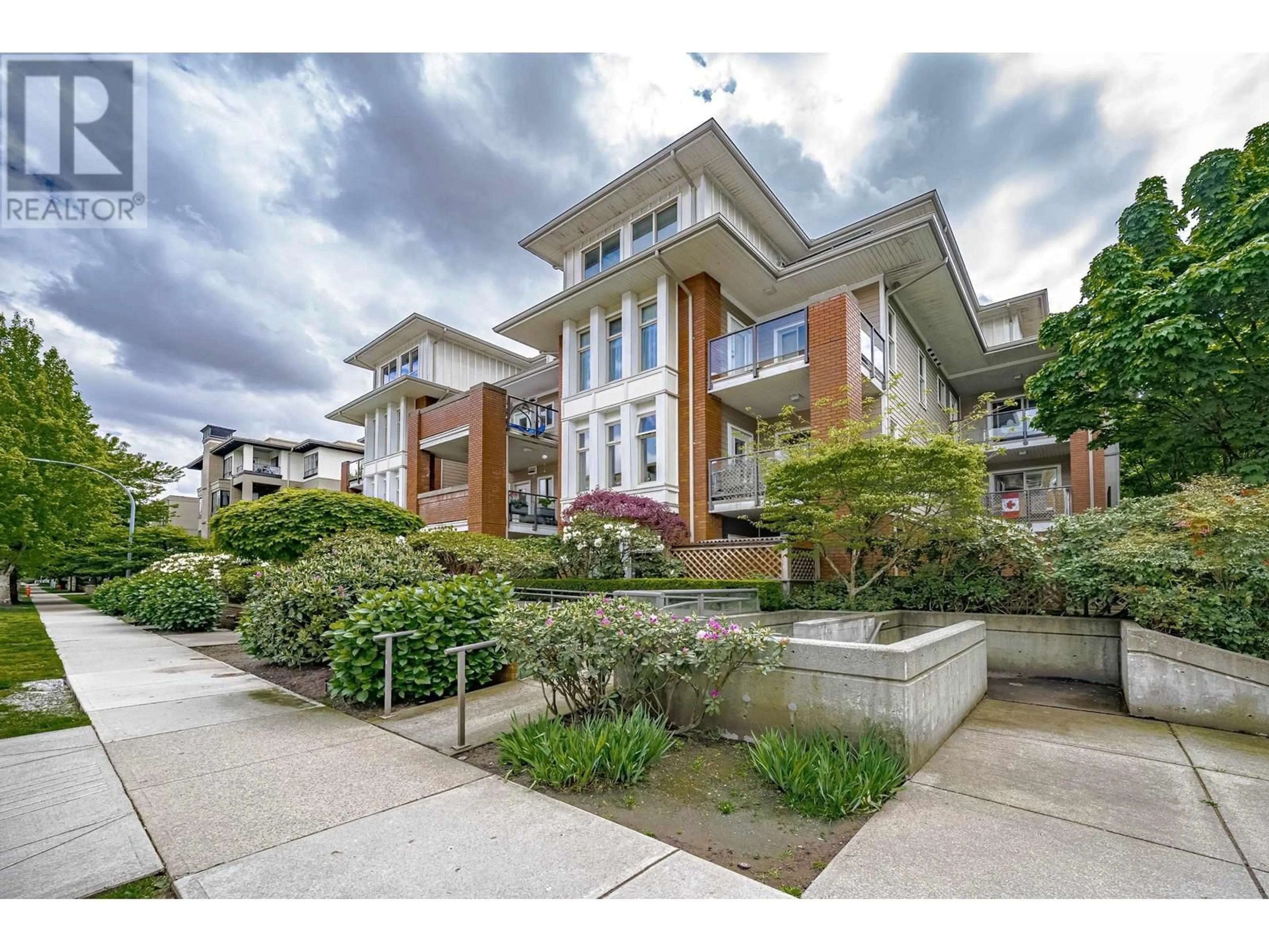 A pic from outside/outdoor area/front of a property/back of a property/a pic from drone, street for 201 - 2488 WELCHER AVENUE, Port Coquitlam British Columbia V3C1X7