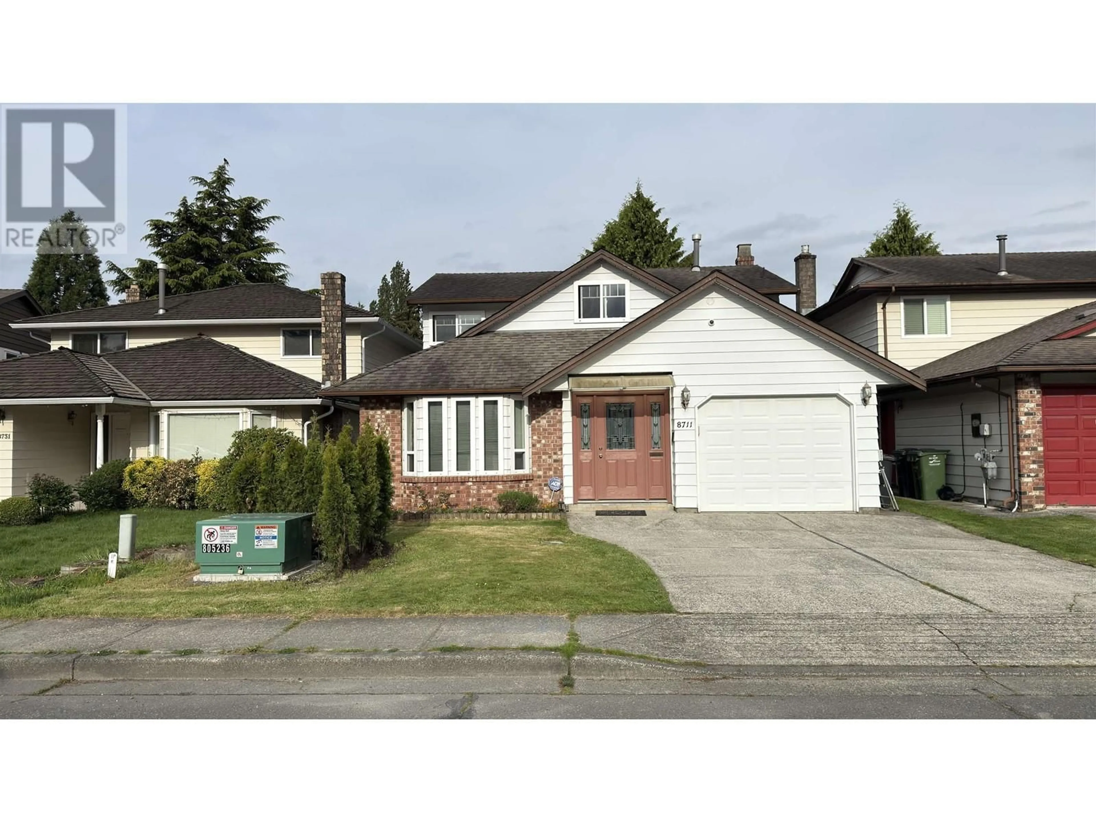 Home with vinyl exterior material, street for 8711 DELAWARE ROAD, Richmond British Columbia V7C4X6
