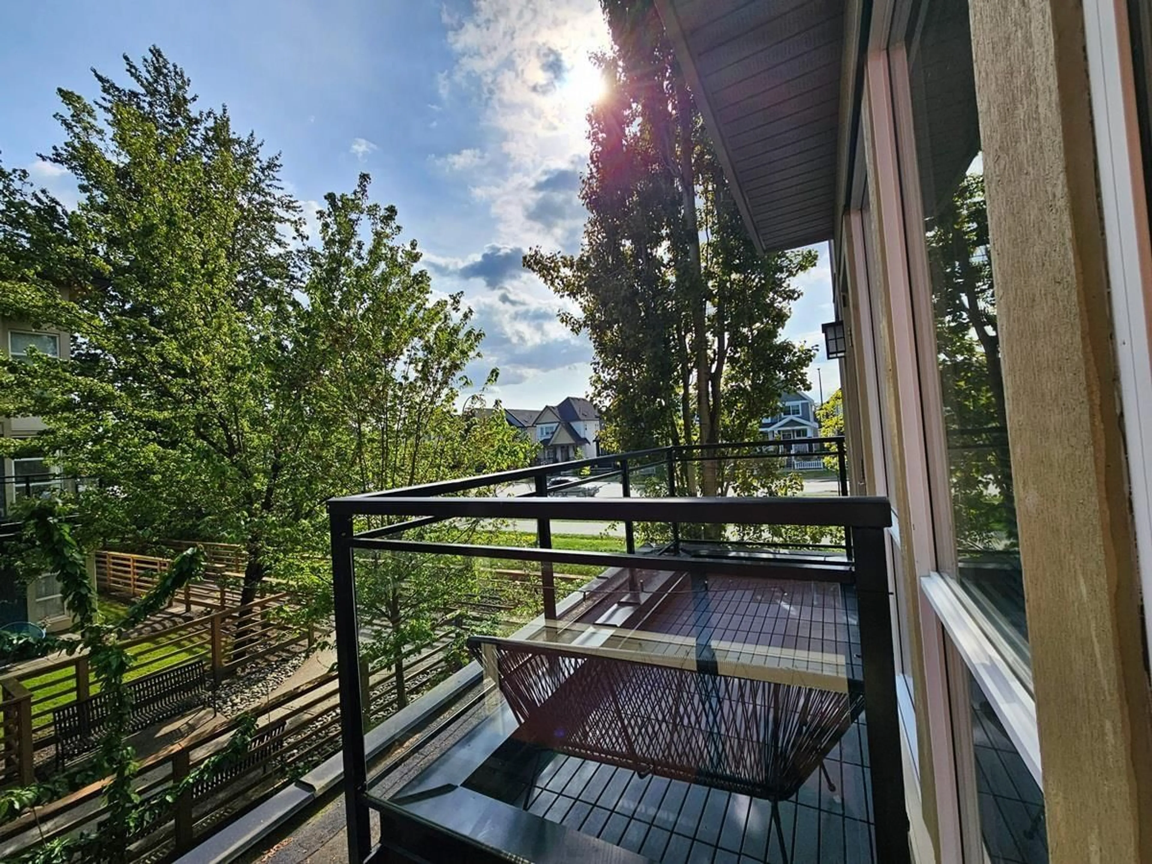 Balcony in the apartment, forest/trees view for 21 - 19477 72A, Surrey British Columbia V4N6M2