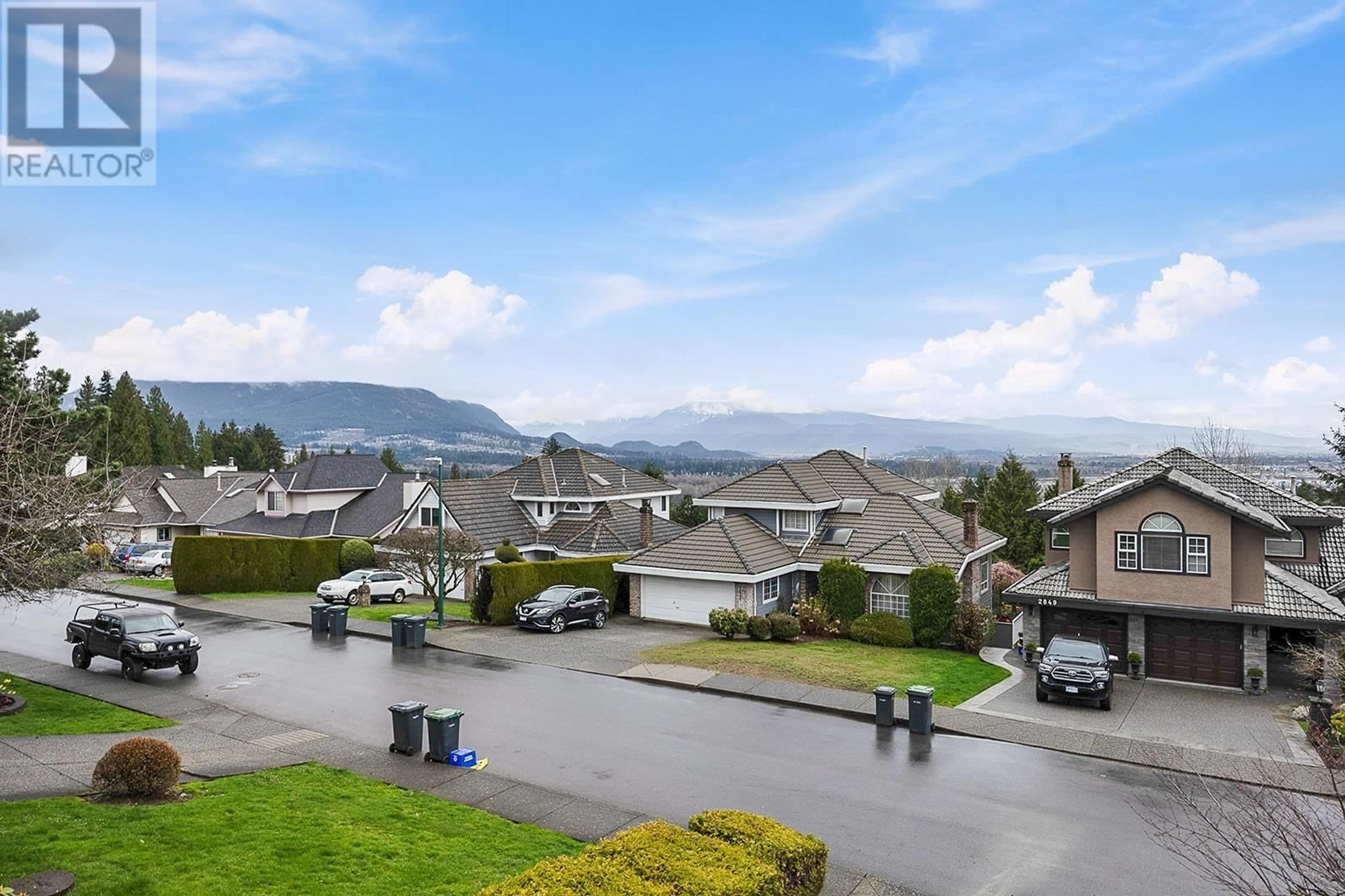 A pic from outside/outdoor area/front of a property/back of a property/a pic from drone, mountain view for 2850 MARA DRIVE, Coquitlam British Columbia V3C5L2