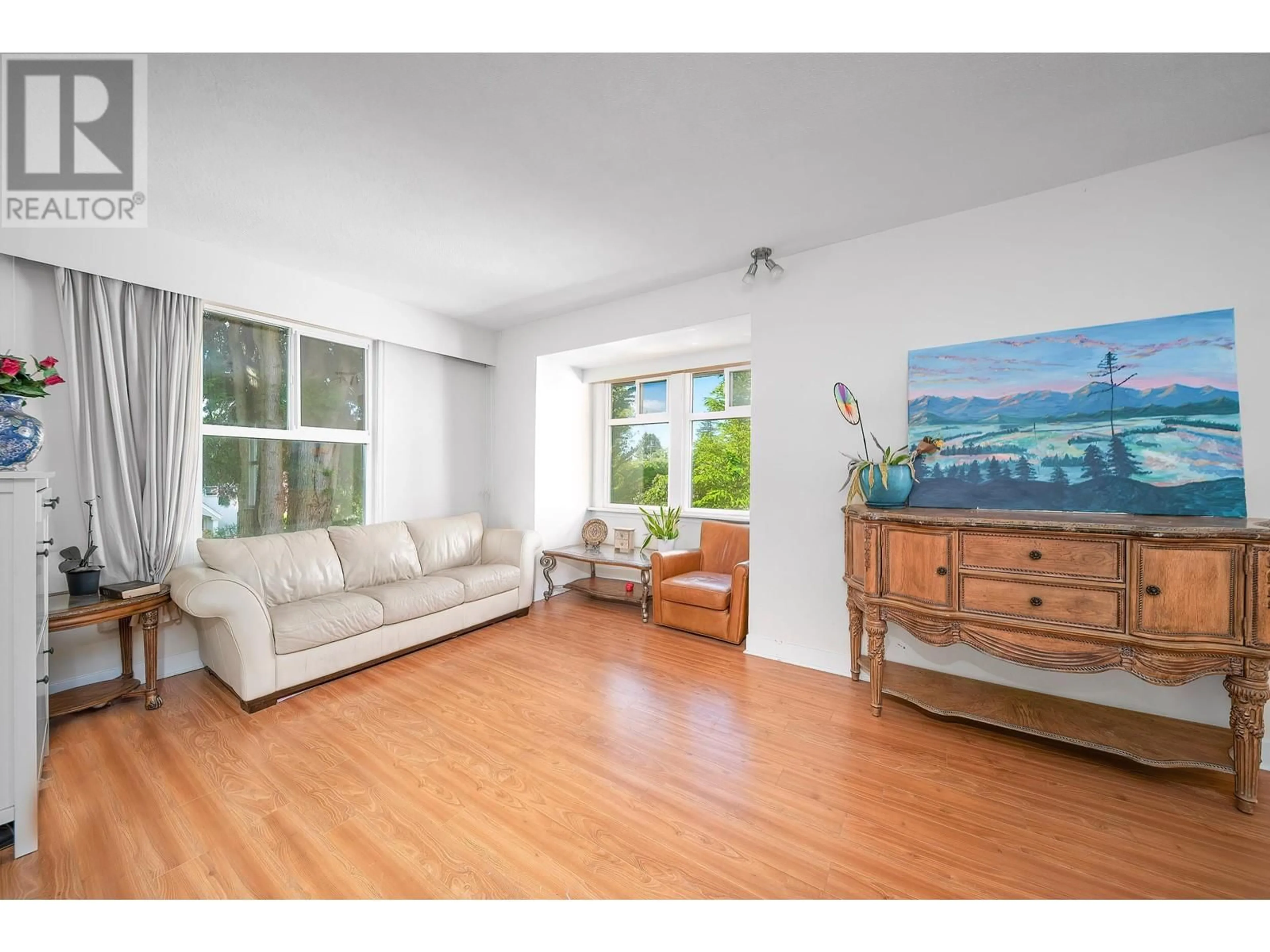 Living room with furniture, wood/laminate floor for 1623 66 AVENUE, Vancouver British Columbia V6P2S1