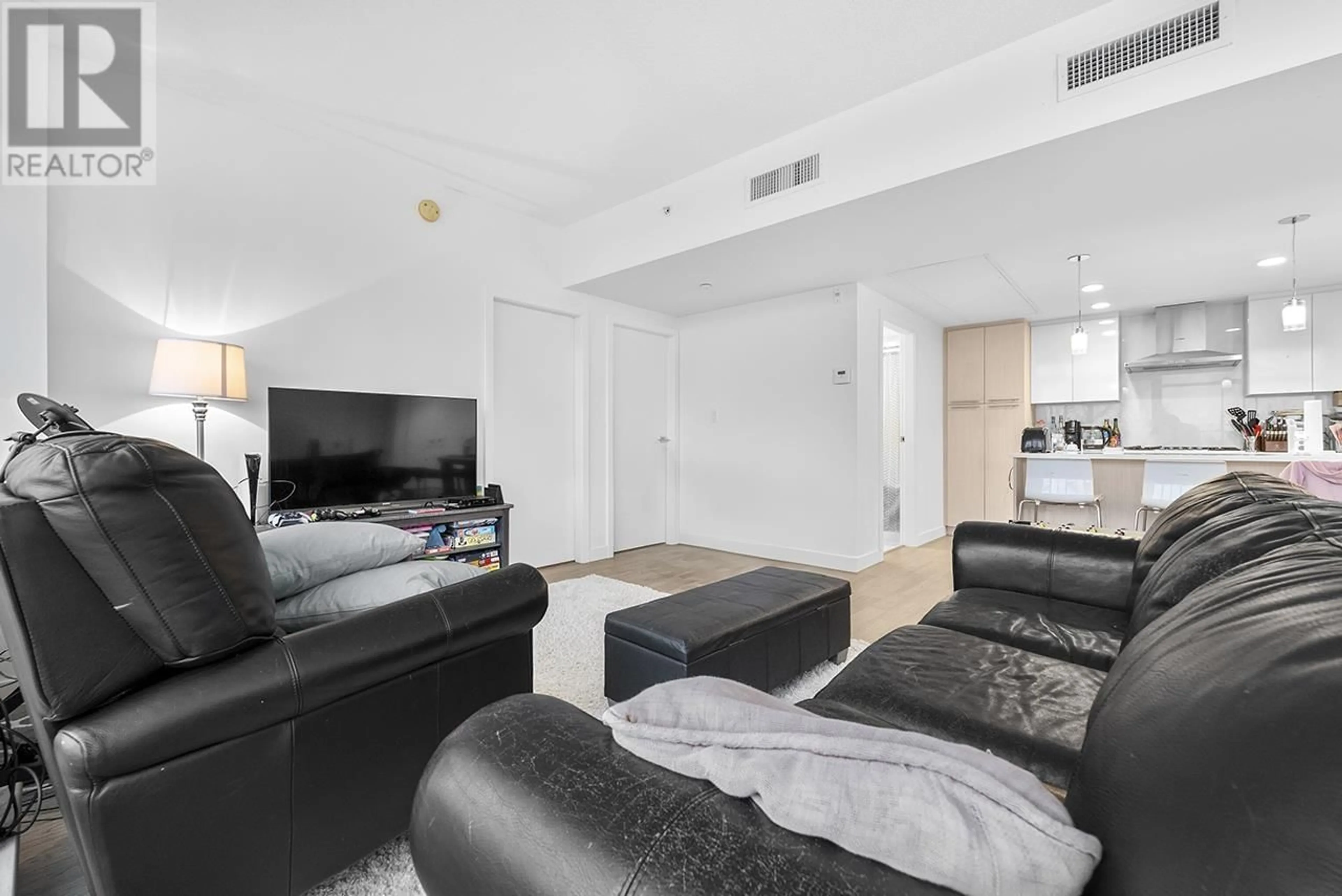 Living room with furniture, floor is not visible for 303 - 5077 CAMBIE STREET, Vancouver British Columbia V5Z0H7