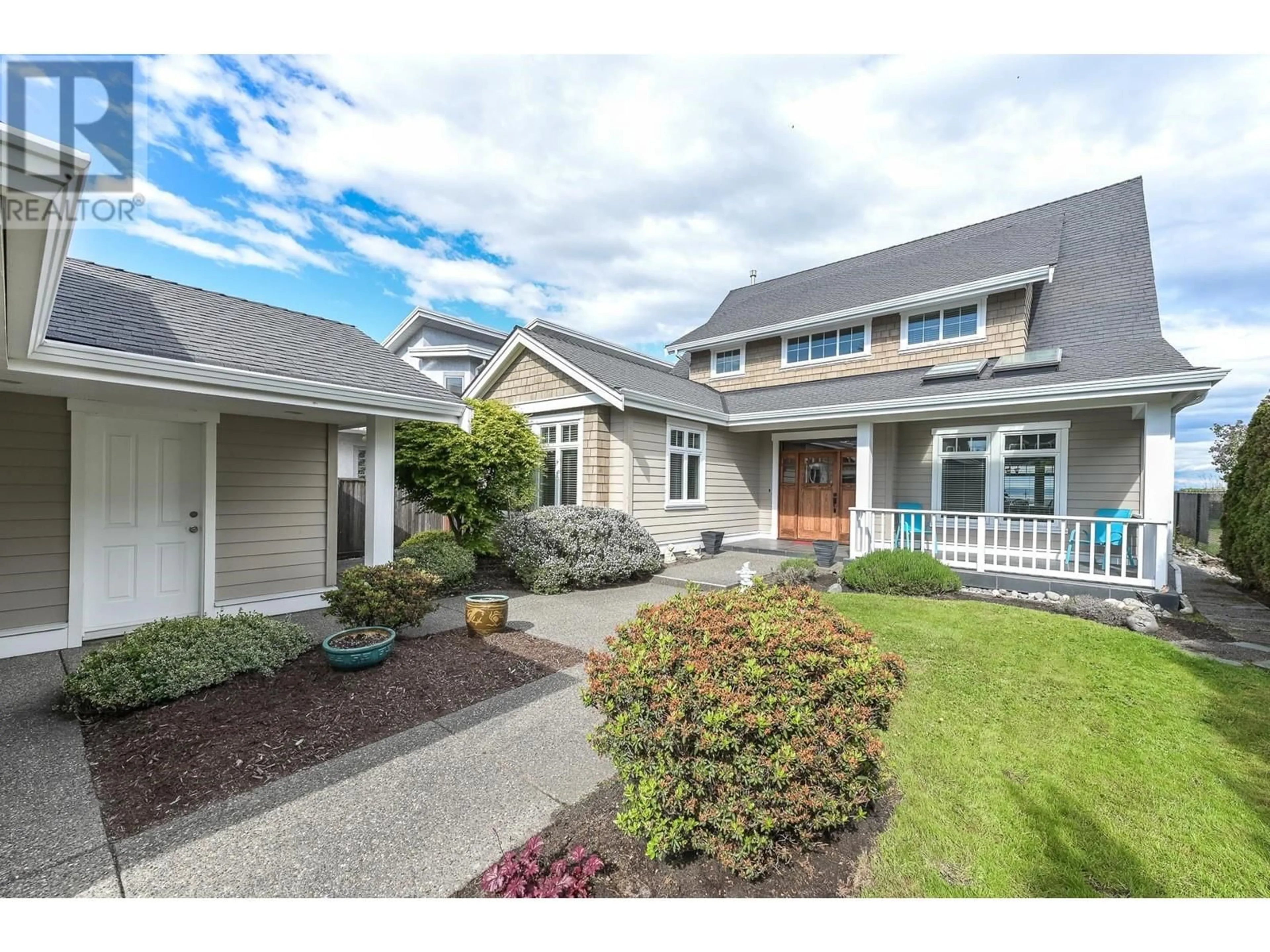 Home with vinyl exterior material, street for 1682 BEACH GROVE ROAD, Delta British Columbia V4L1P3