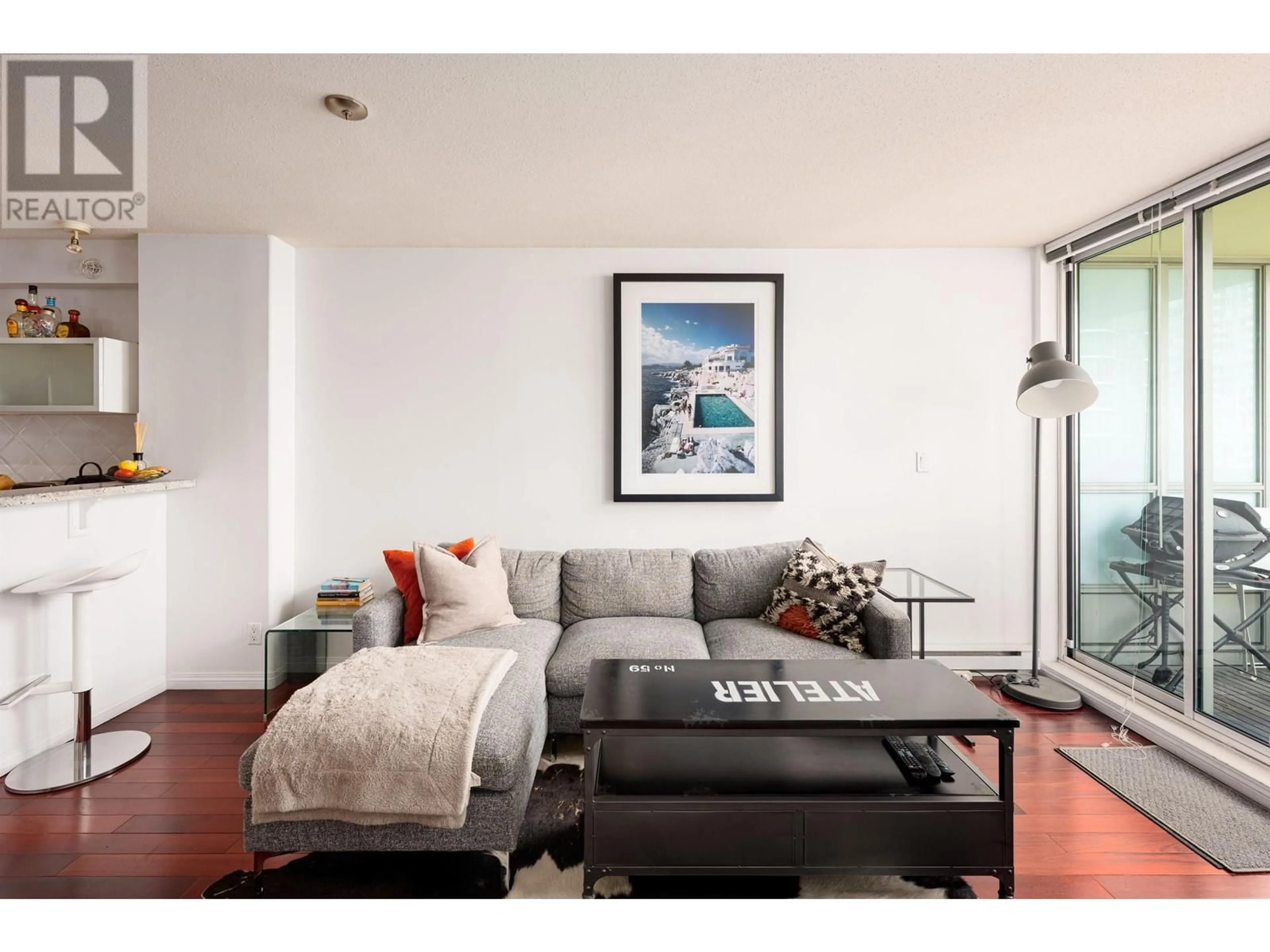 Living room with furniture, wood/laminate floor for 604 - 1328 PENDER STREET, Vancouver British Columbia V6E4T1