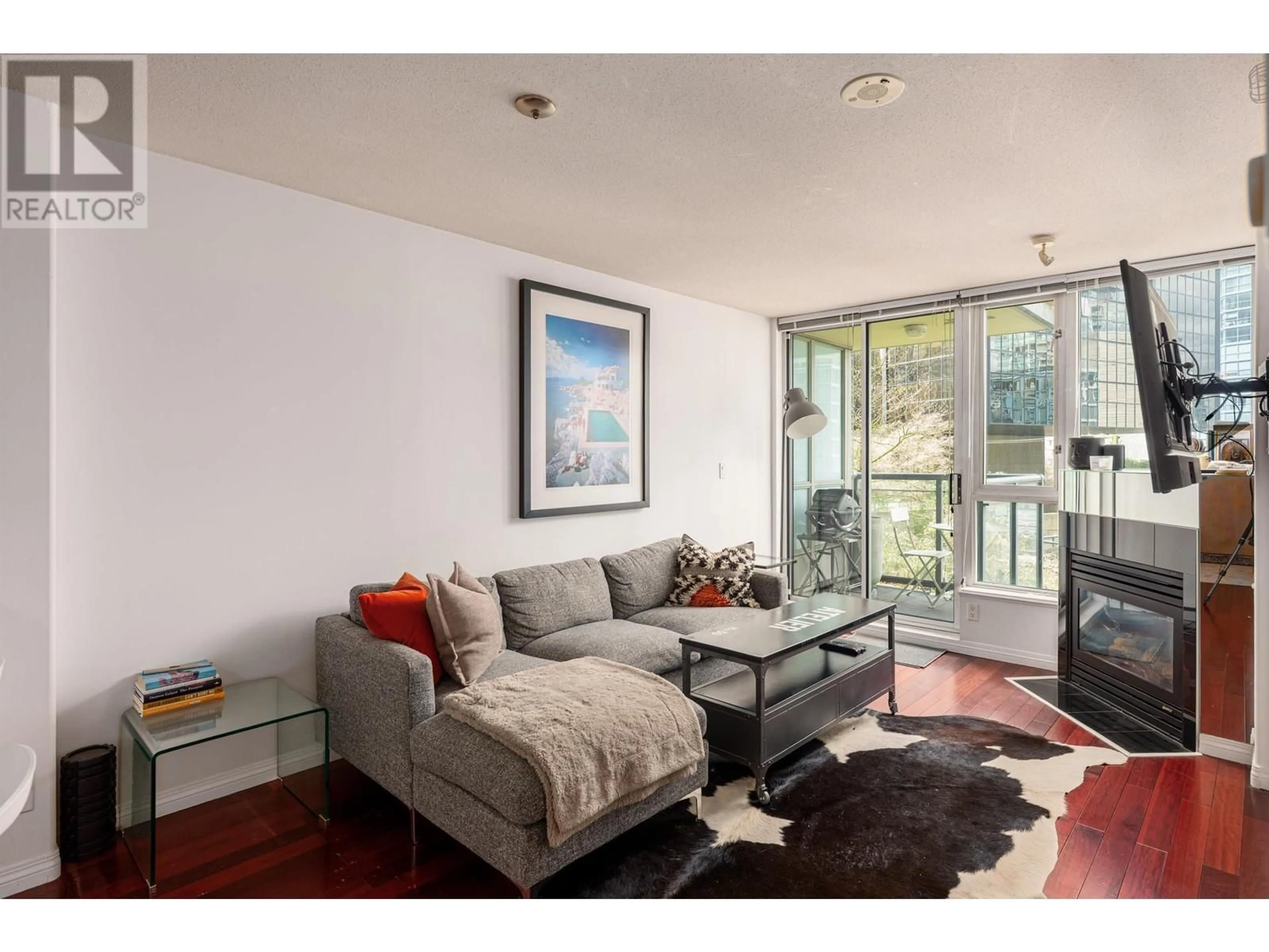 Living room with furniture, unknown for 604 - 1328 PENDER STREET, Vancouver British Columbia V6E4T1