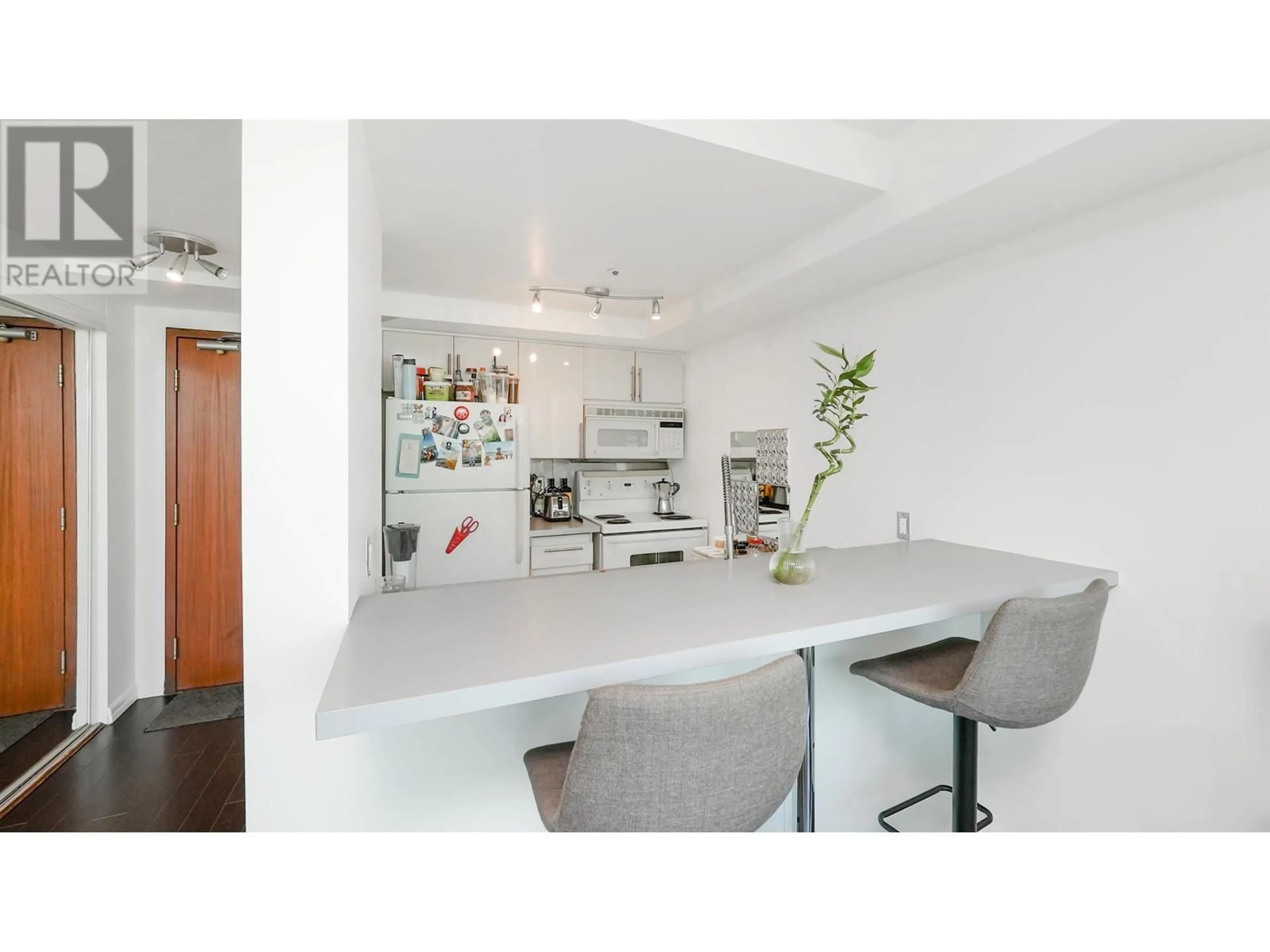 Open concept kitchen, unknown for 1704 - 555 JERVIS STREET, Vancouver British Columbia V6E4N1